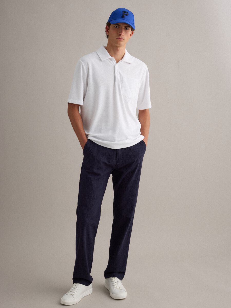 Polo bianca in misto cotone regular fit con taschino_1