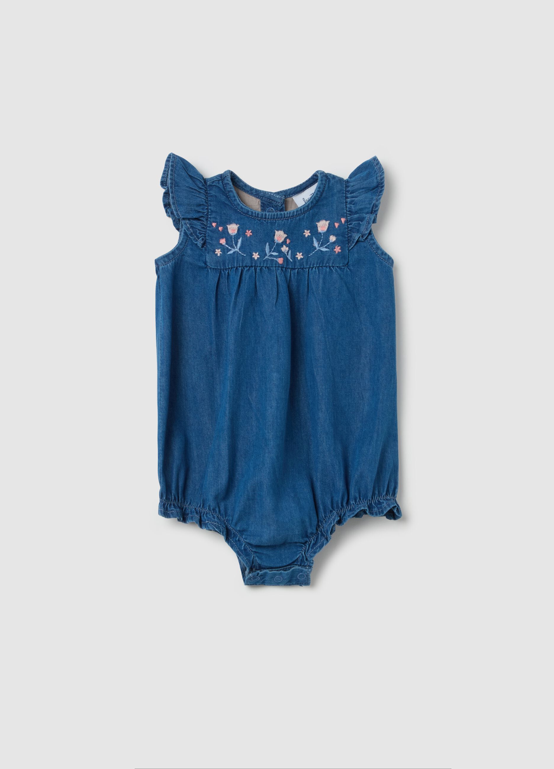 Denim romper suit with floral embroidery