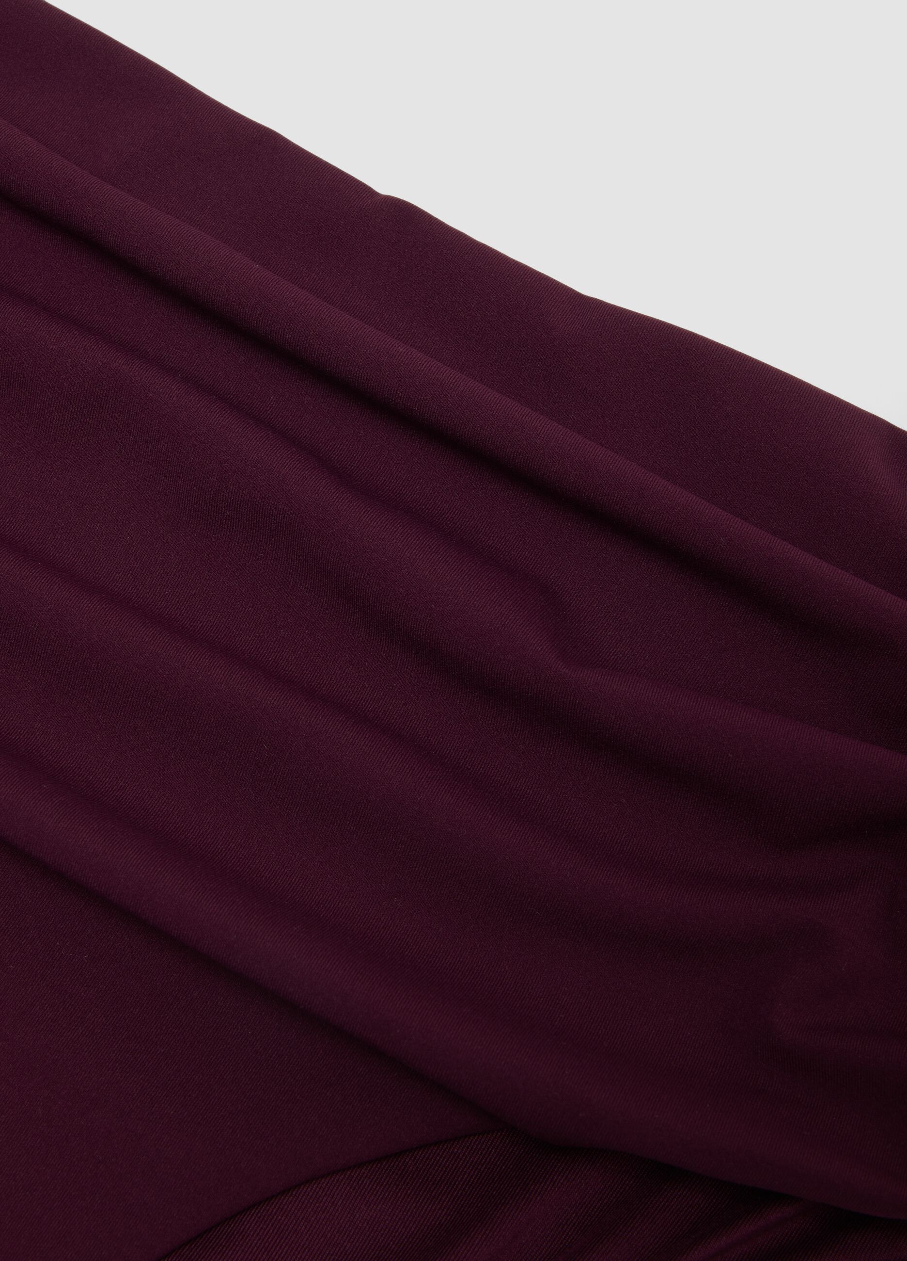 Purple high-waist stretch bikini bottoms with shaping effect