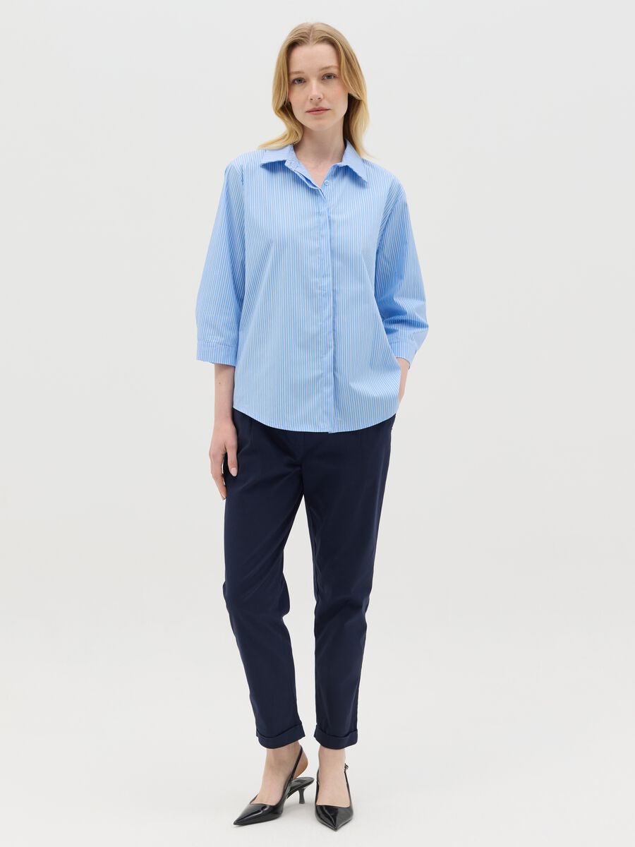 Blue cropped trousers in stretch cotton_0