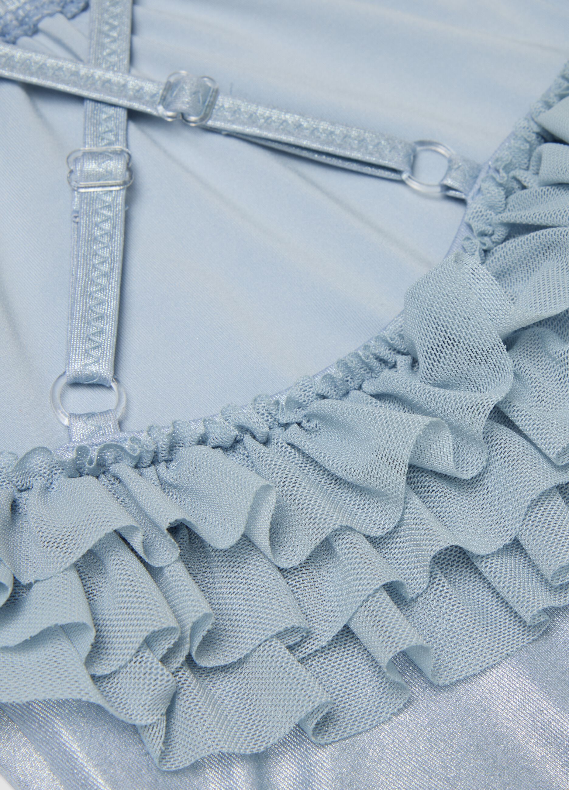 Light blue stretch swimsuit with ruffle detail for baby girls