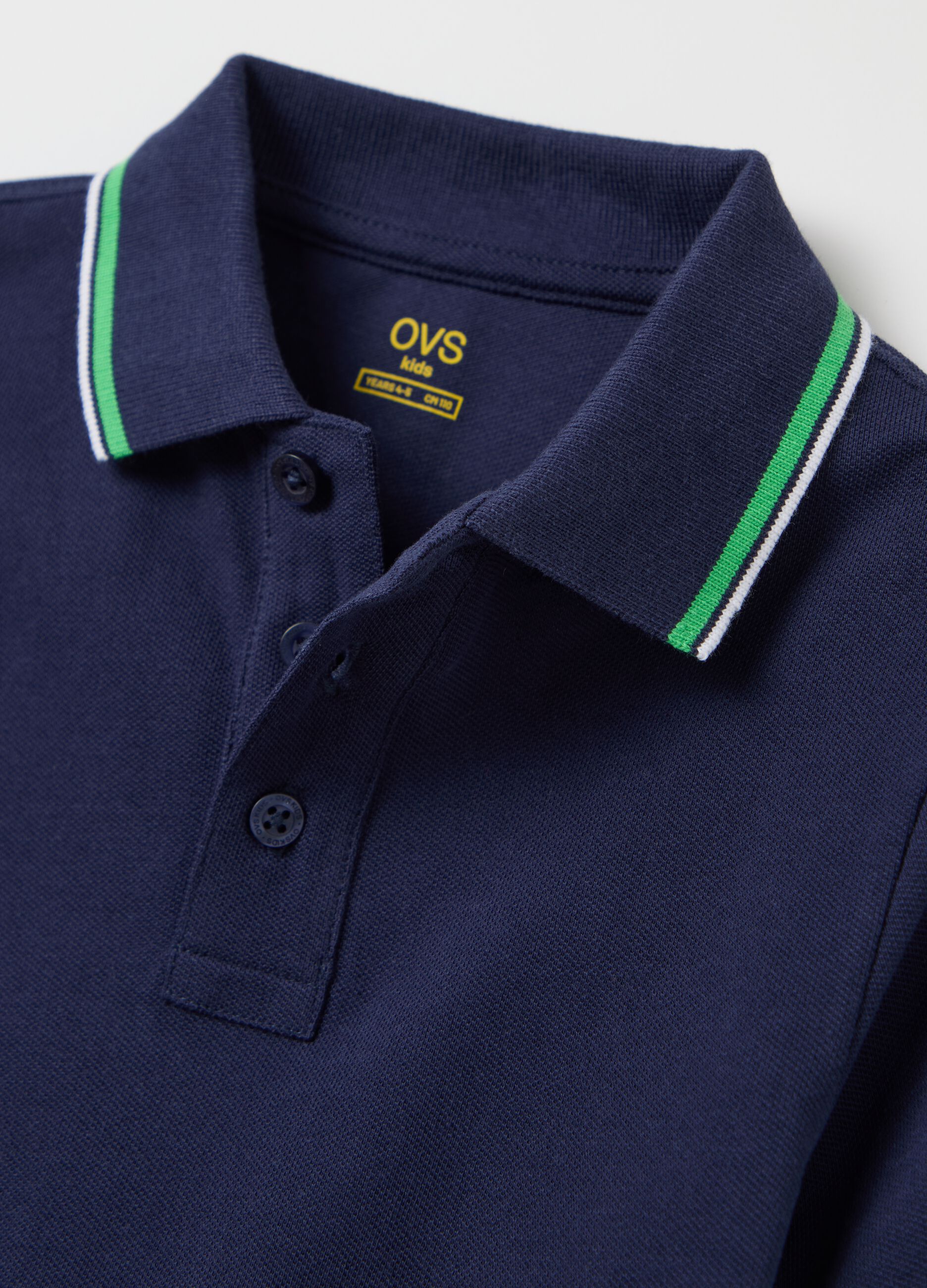 Blue cotton polo shirt with striped edging