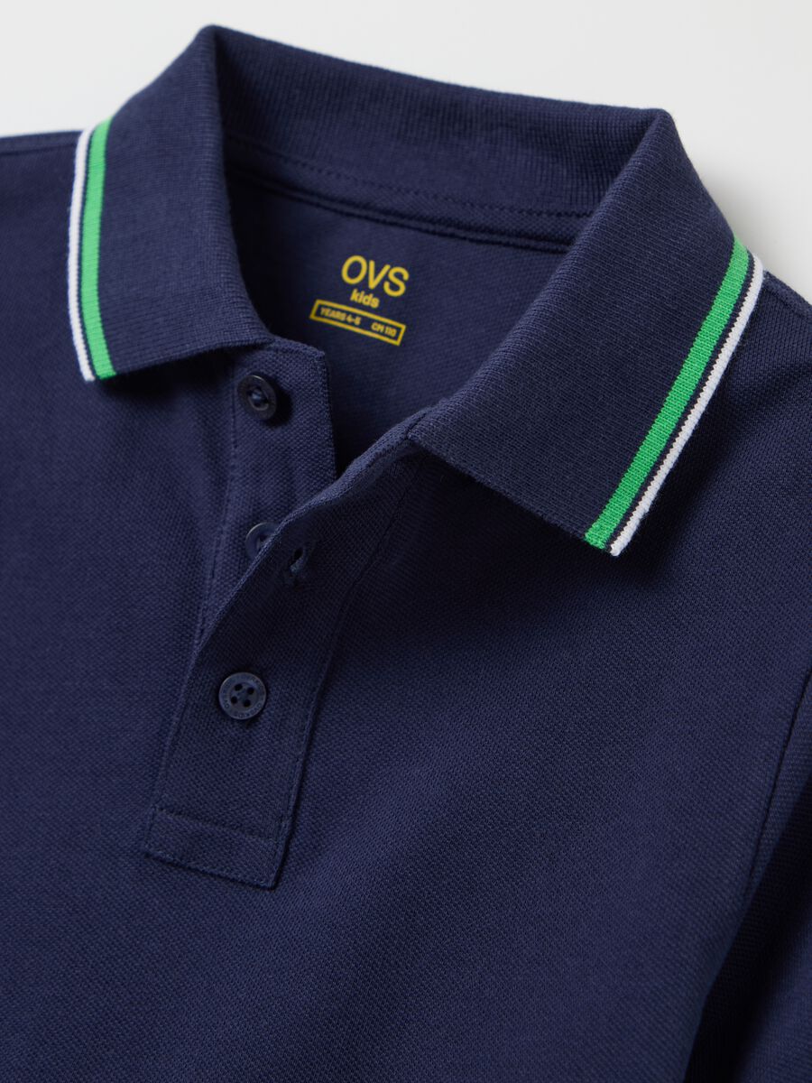 Blue cotton polo shirt with striped edging_2