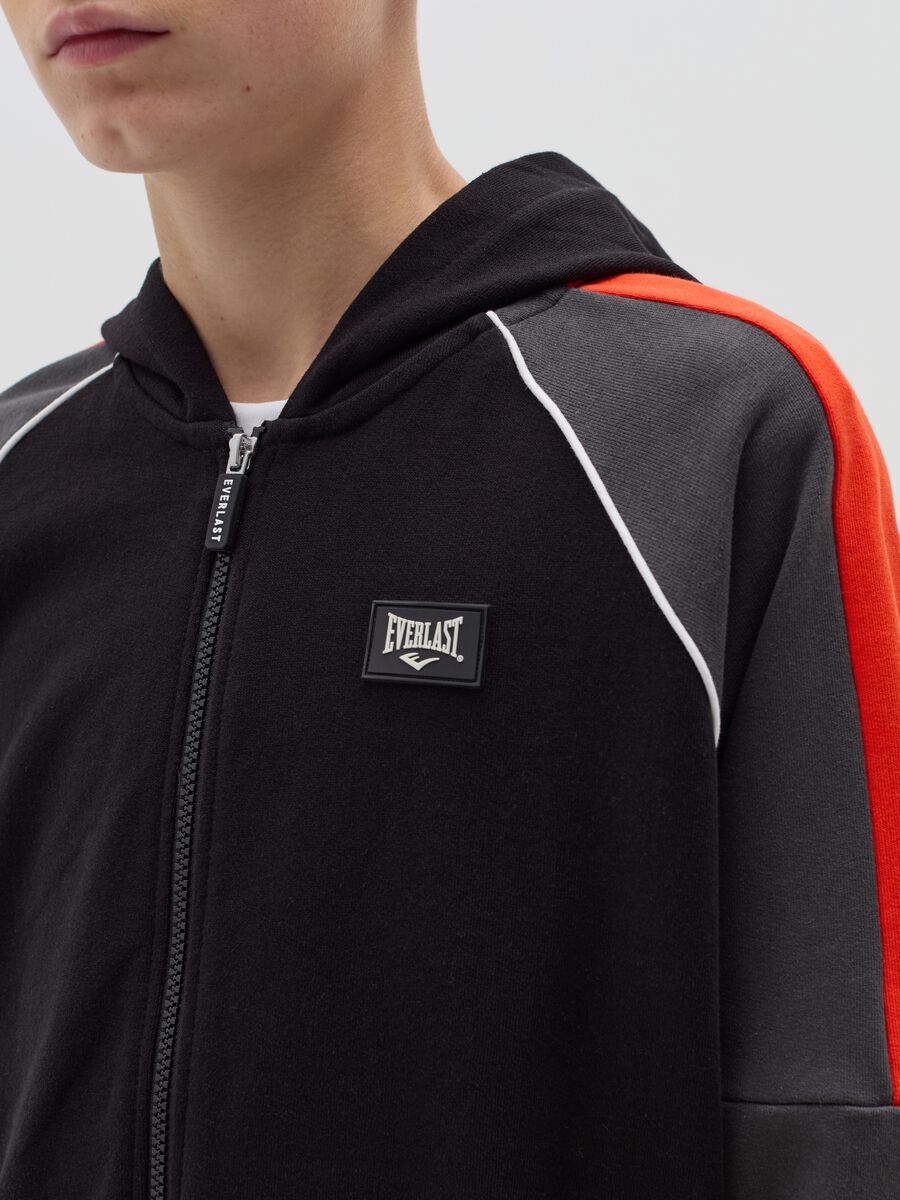 Full-zip con cappuccio e patch logo_1