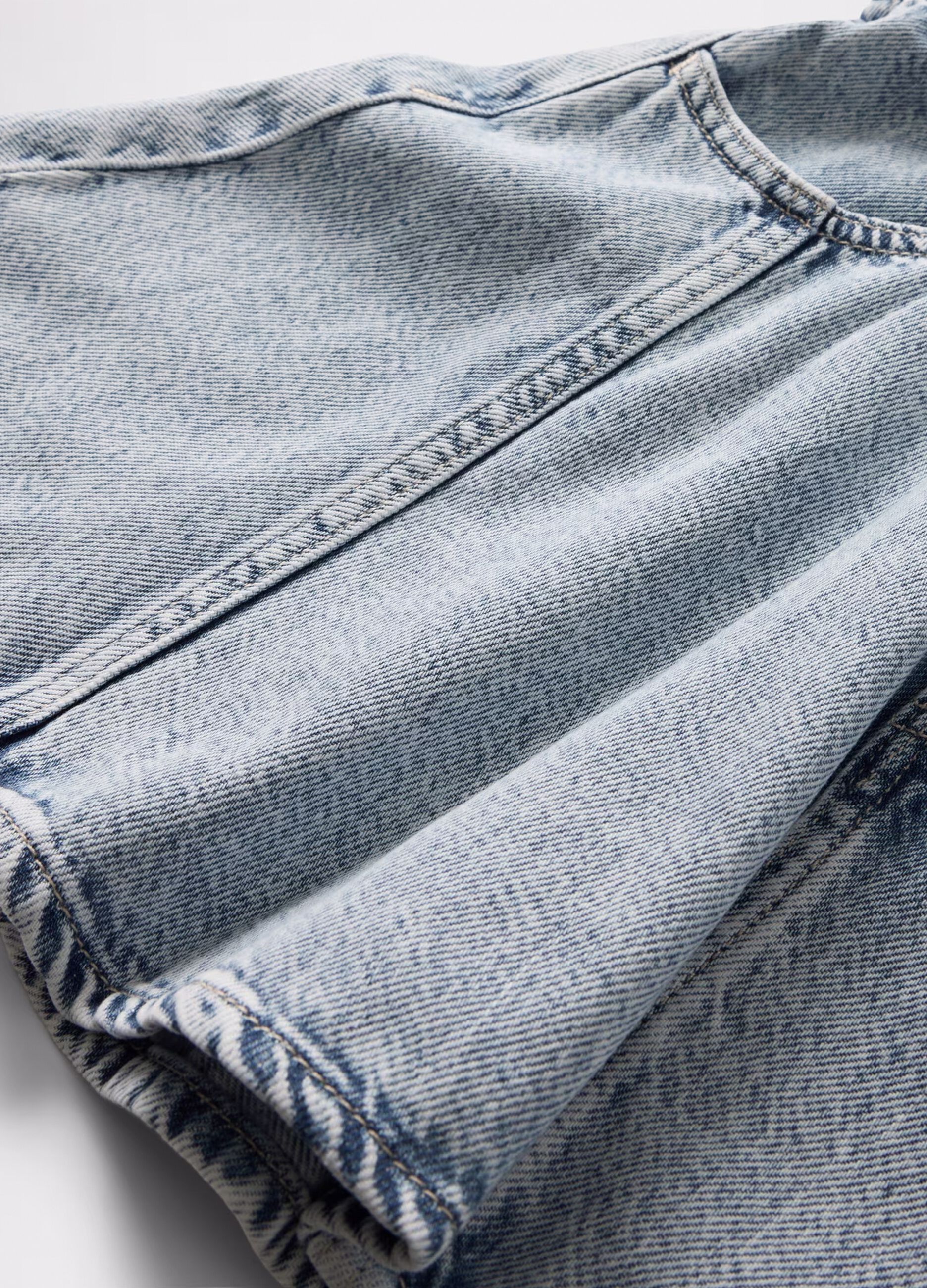 Gonna denim svasata con tasche 