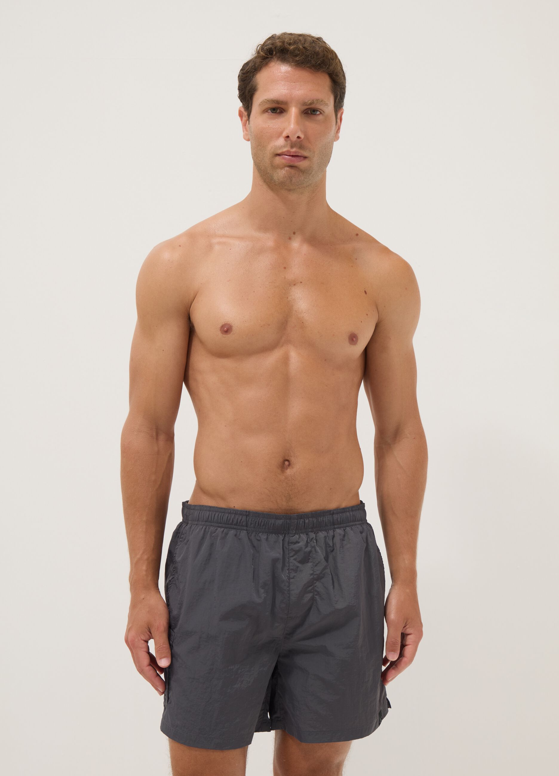 Grey swim shorts with elasticated waist