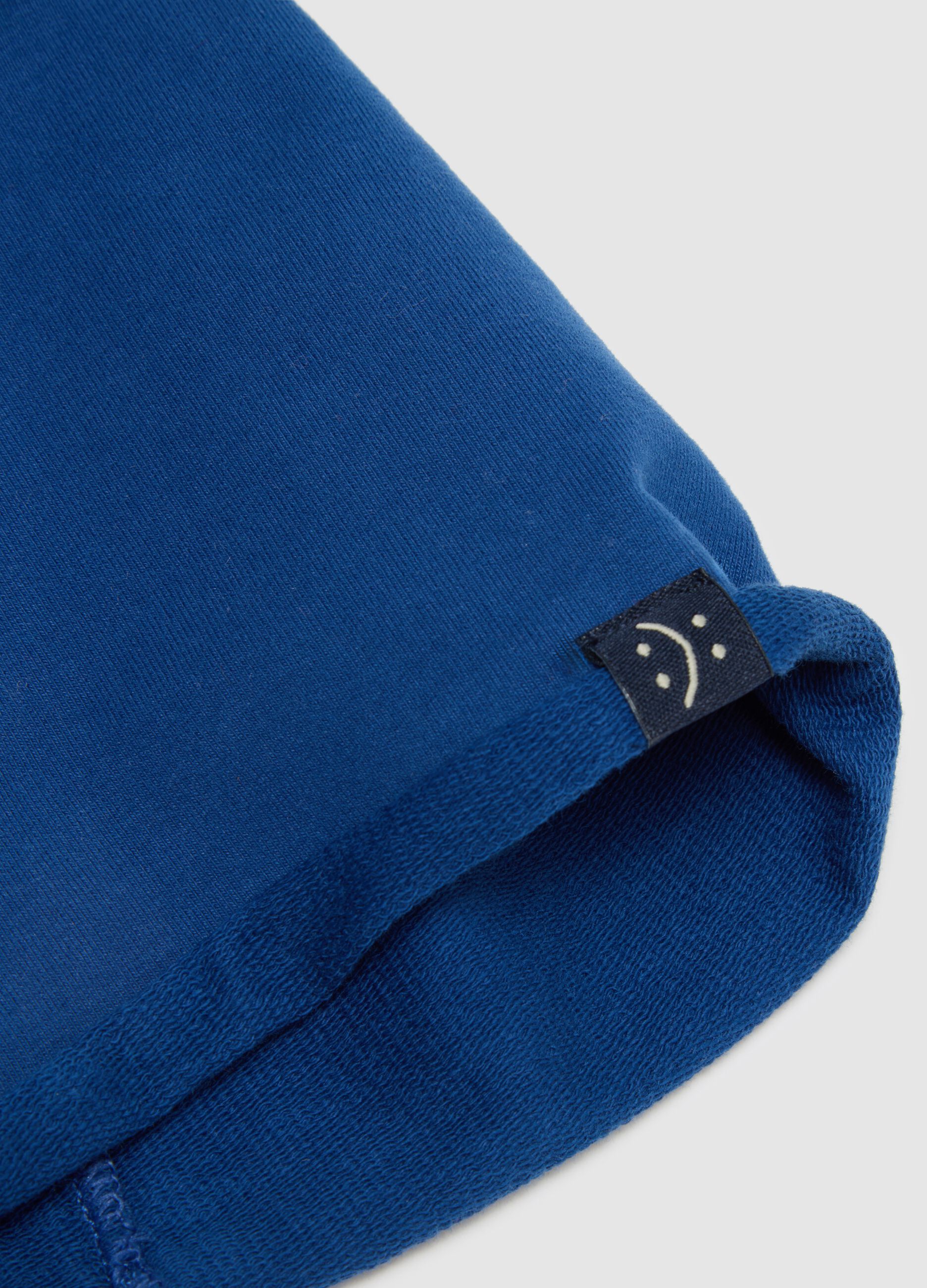 Cappello da ragazzo in cotone blu elasticizzato
