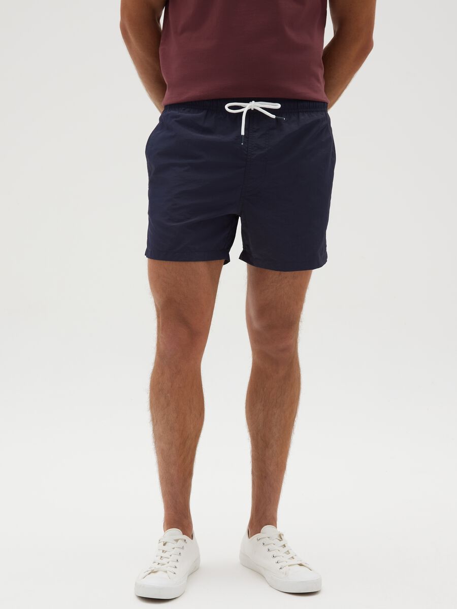 Costume da bagno da uomo blu regular fit con tasca_1
