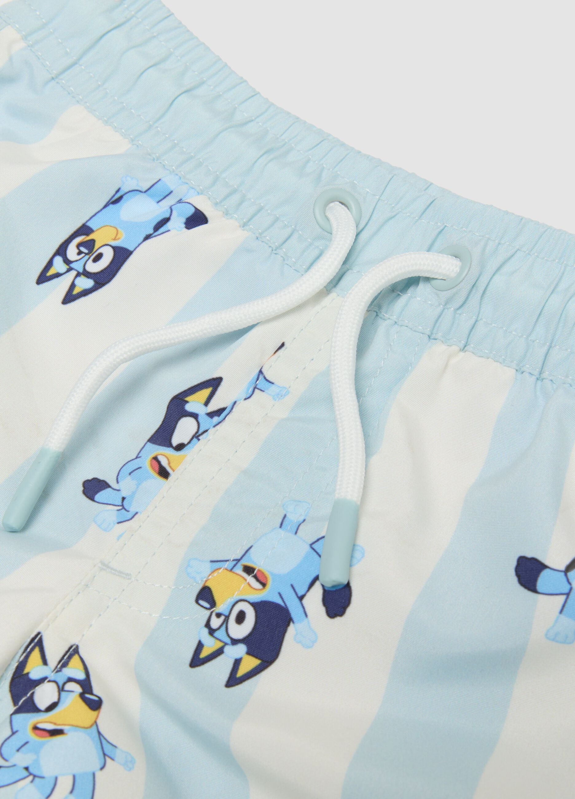 Light blue striped Bluey print swim shorts for boys