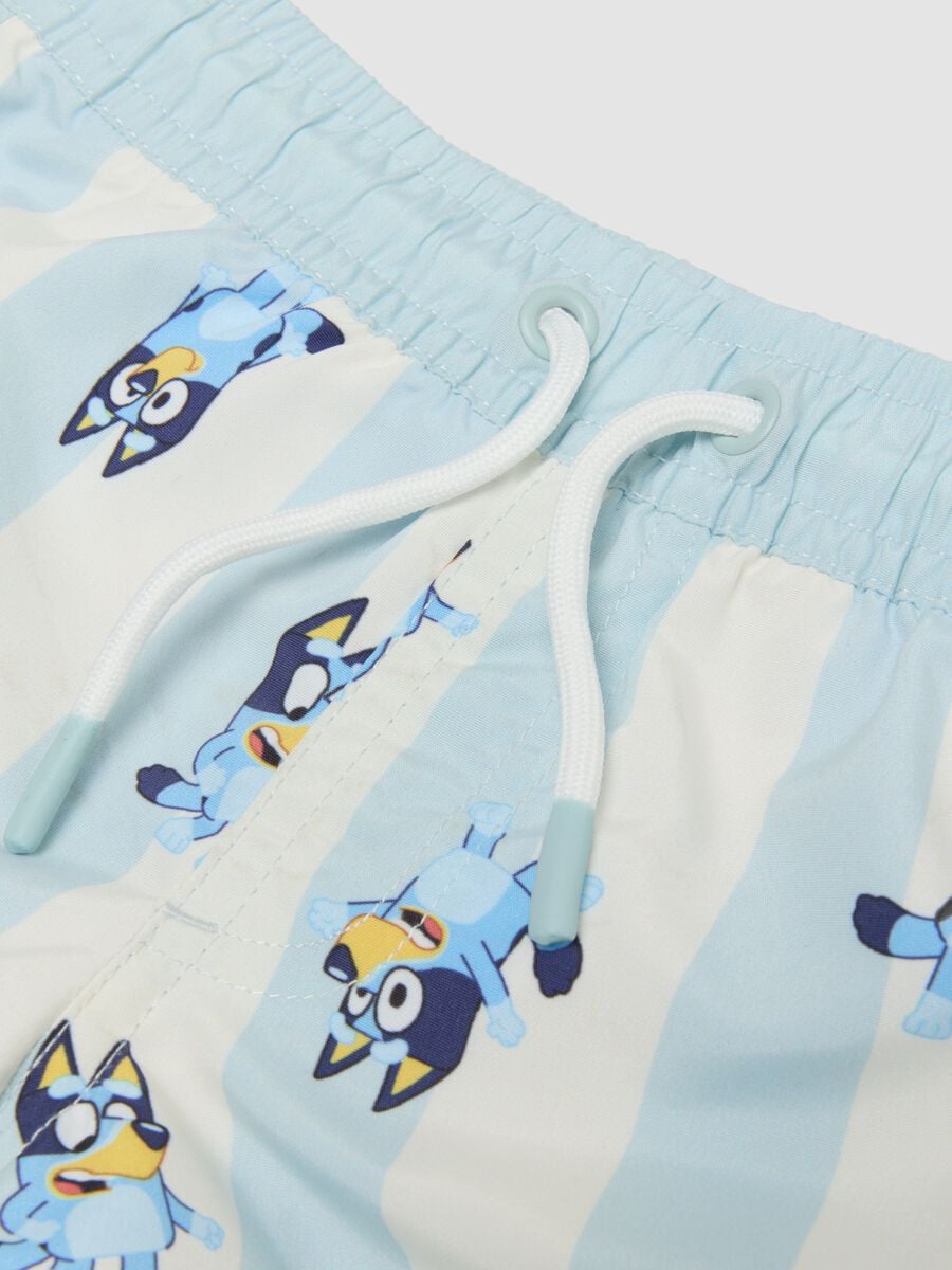 Light blue striped Bluey print swim shorts for boys_2