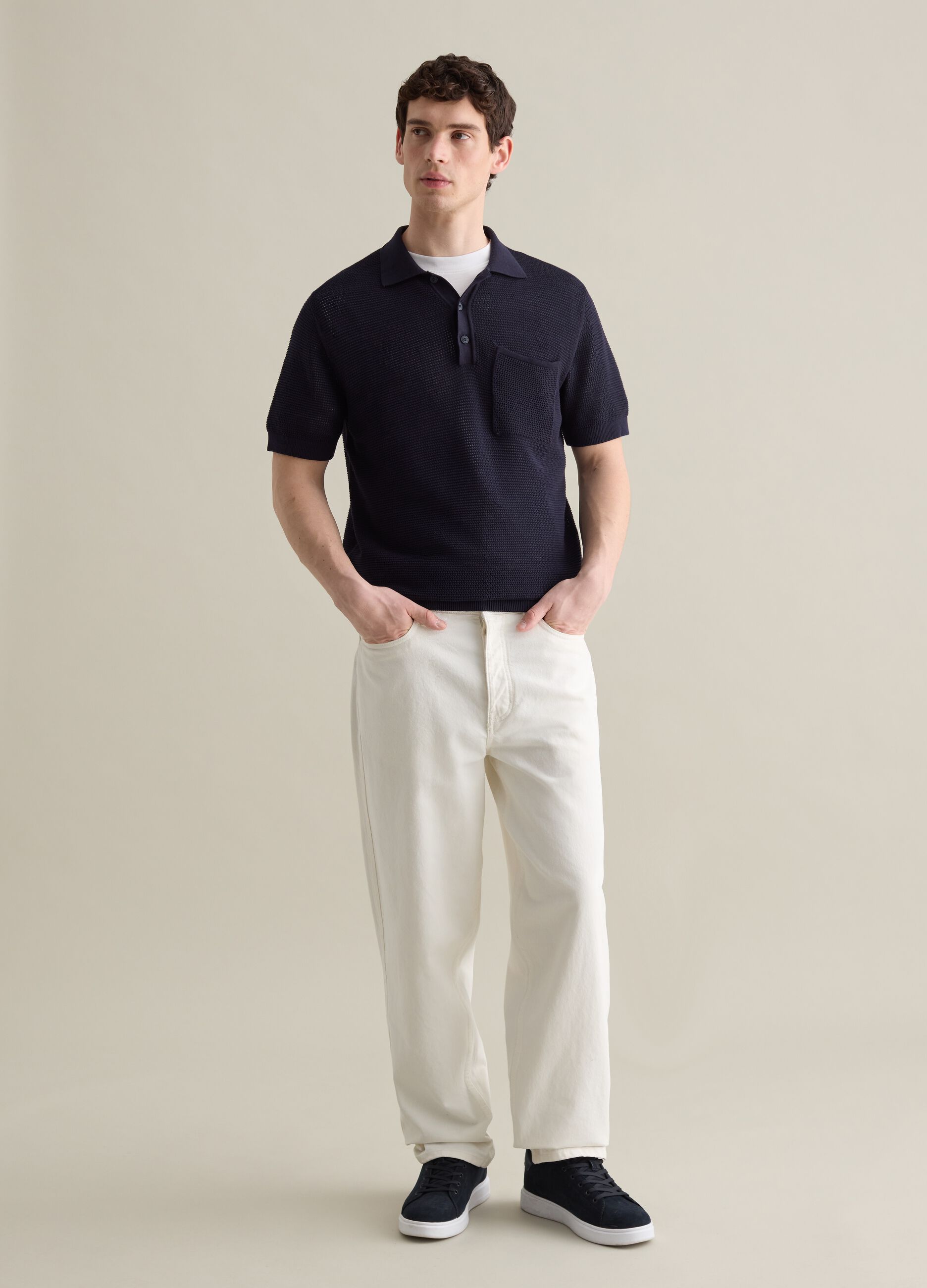 Blue polo shirt in openwork knit