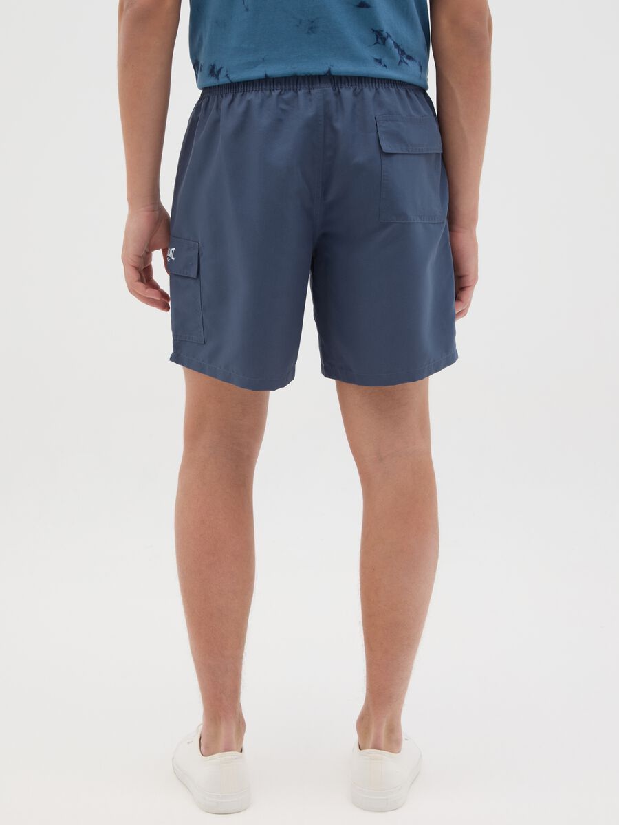 Blue swimming trunks with logo print_3