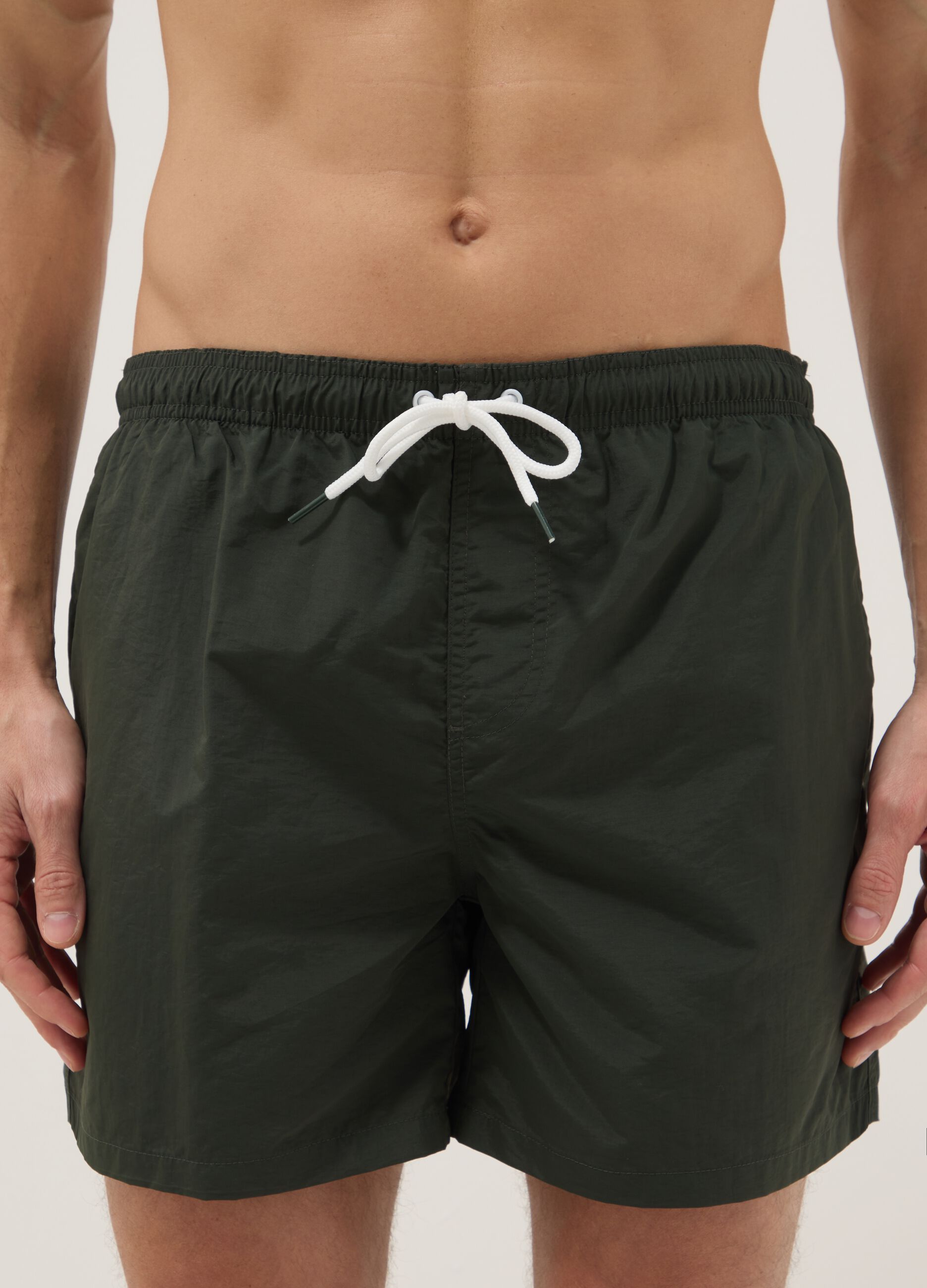 Green regular-fit swim shorts with drawstring