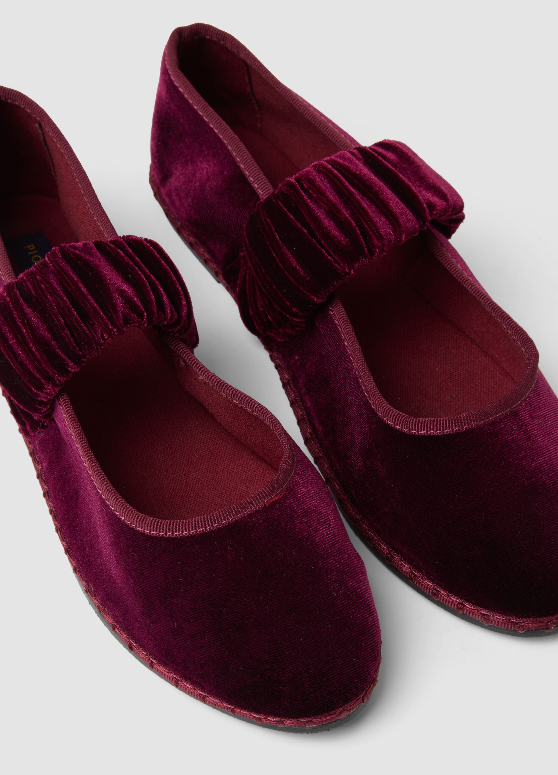 Classic purple furlane with gathered strap