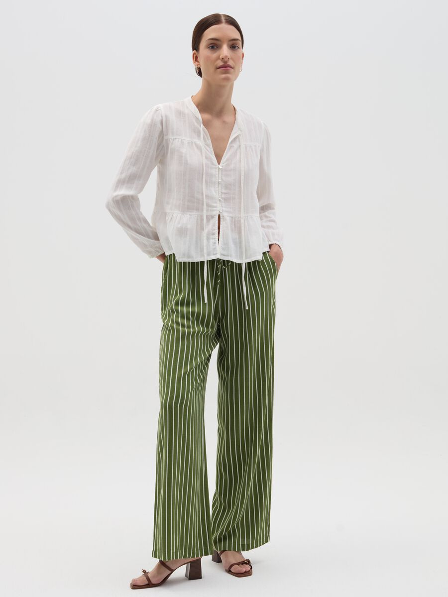 Striped green palazzo trousers in viscose and linen_0
