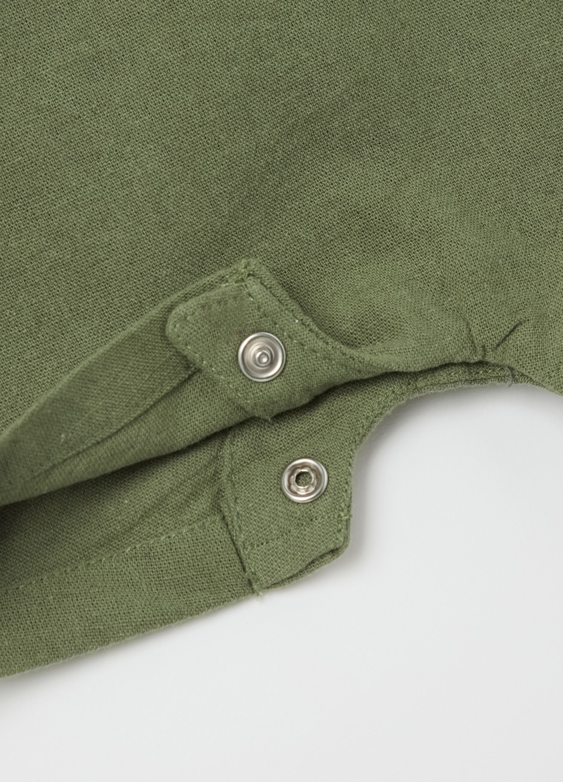 White and green cotton and linen romper