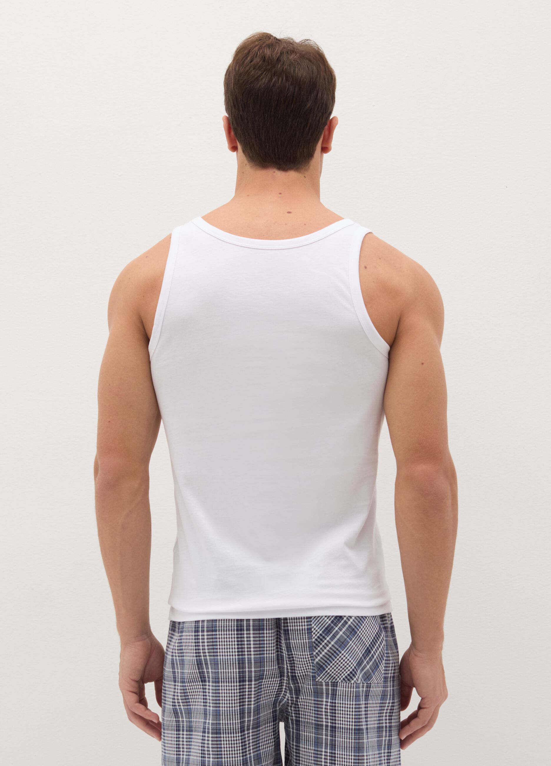 Three-pack racerback vests in organic cotton