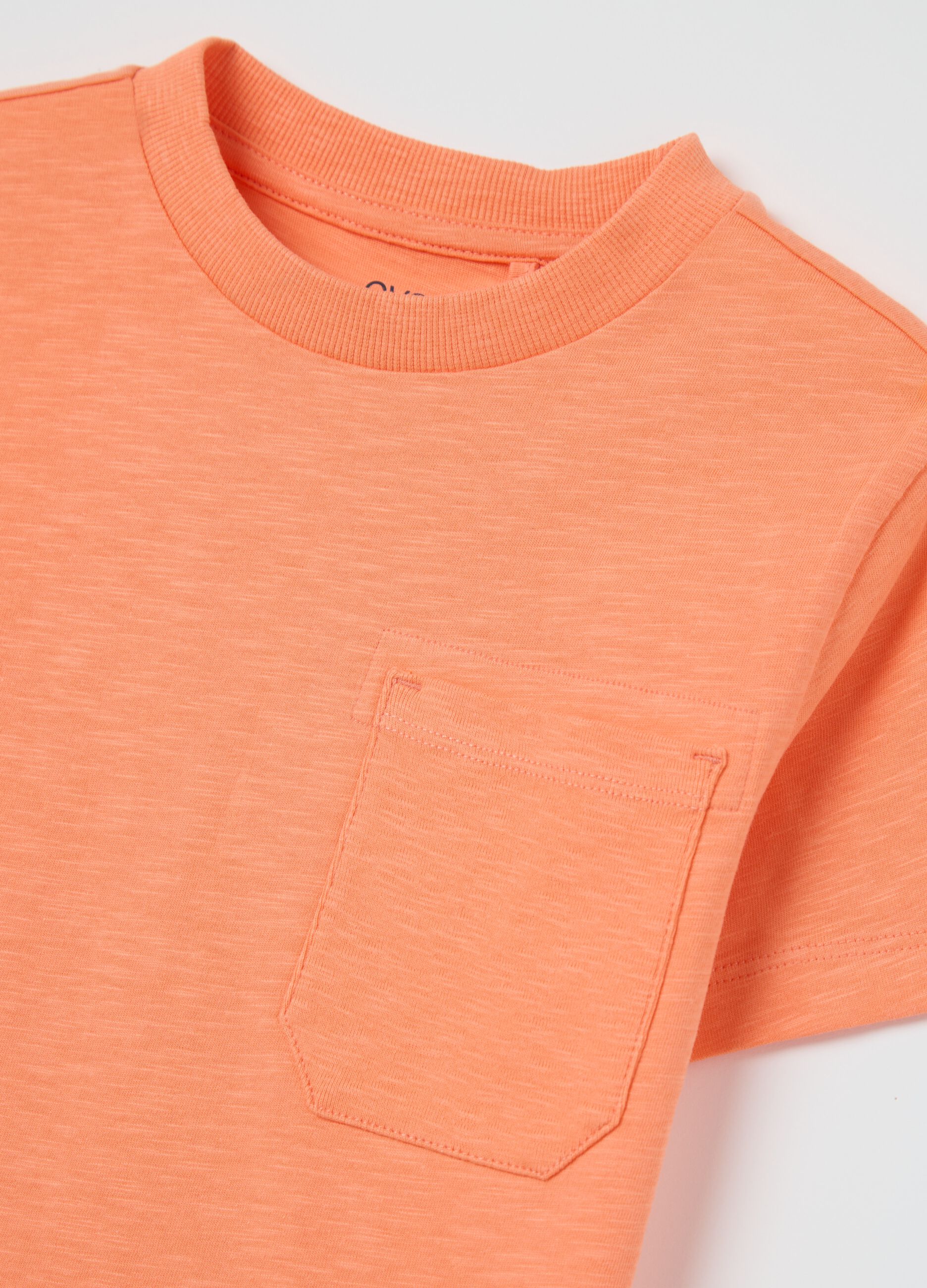 T-shirt arancione in cotone bio con tasca