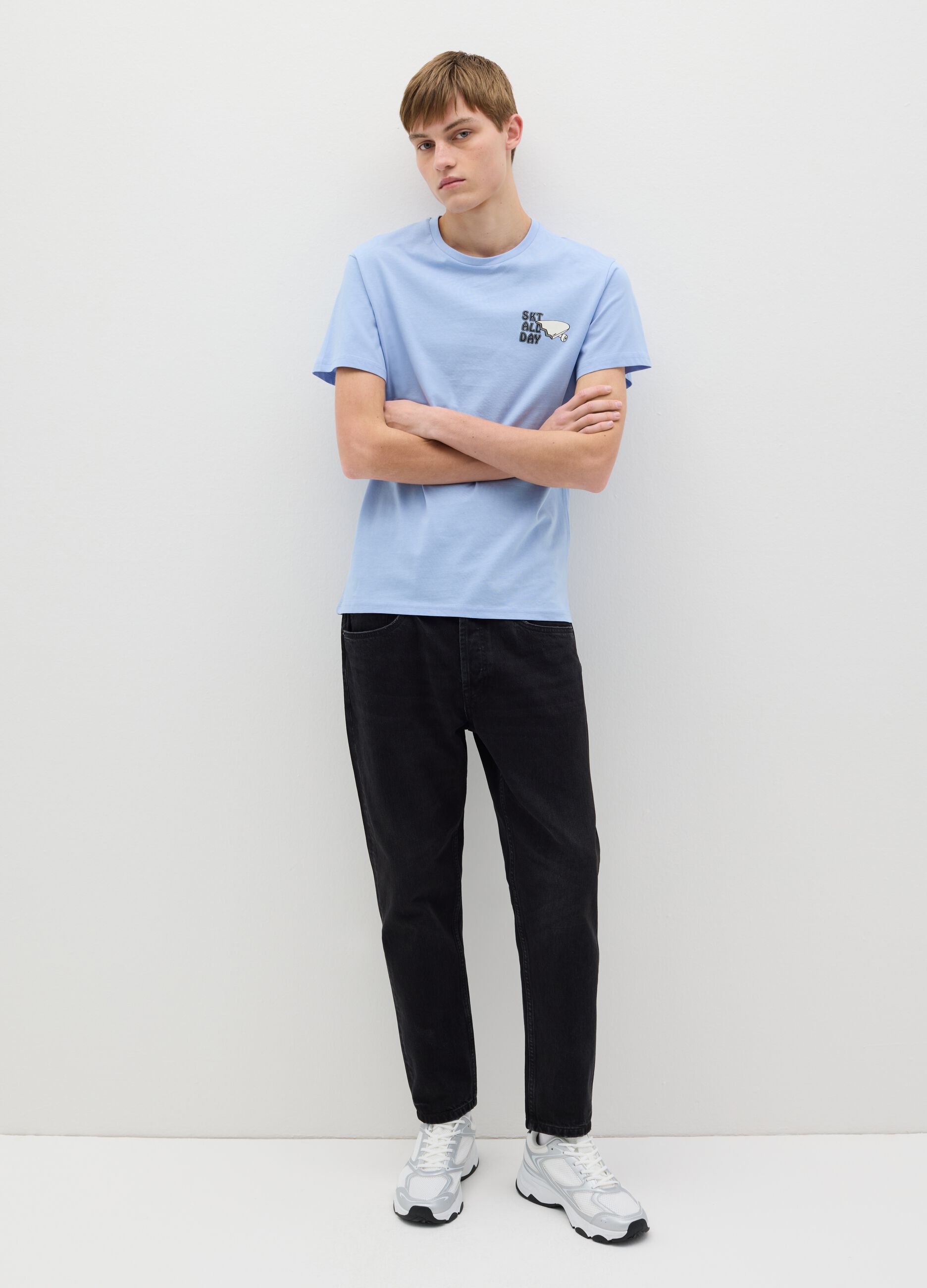 Light blue T-shirt with skateboards print