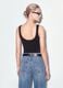 Black stretch cotton top with asymmetric hem and metal eyelets_2
