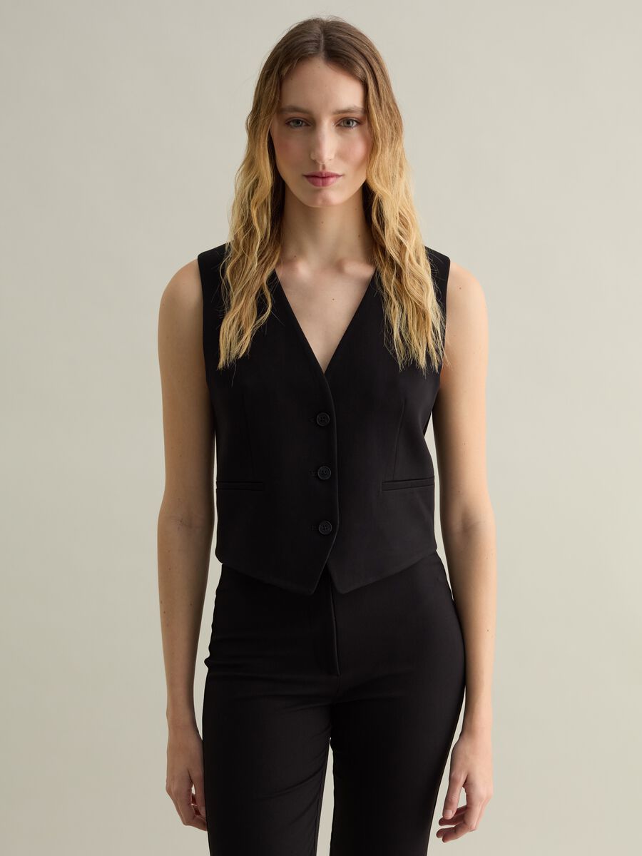 Solid colour waistcoat with buttons_0