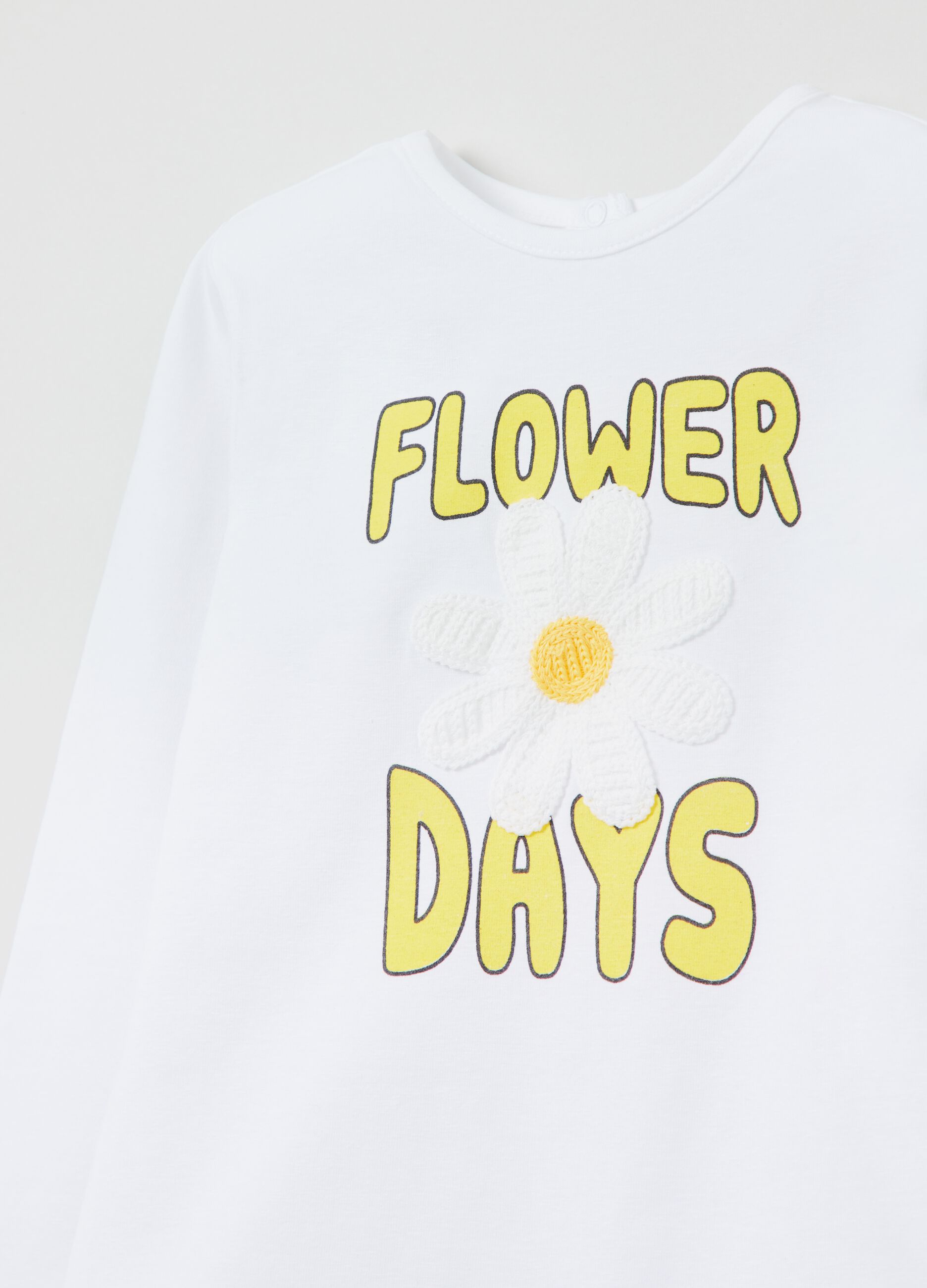 Long-sleeved T-shirt with crocheted flower
