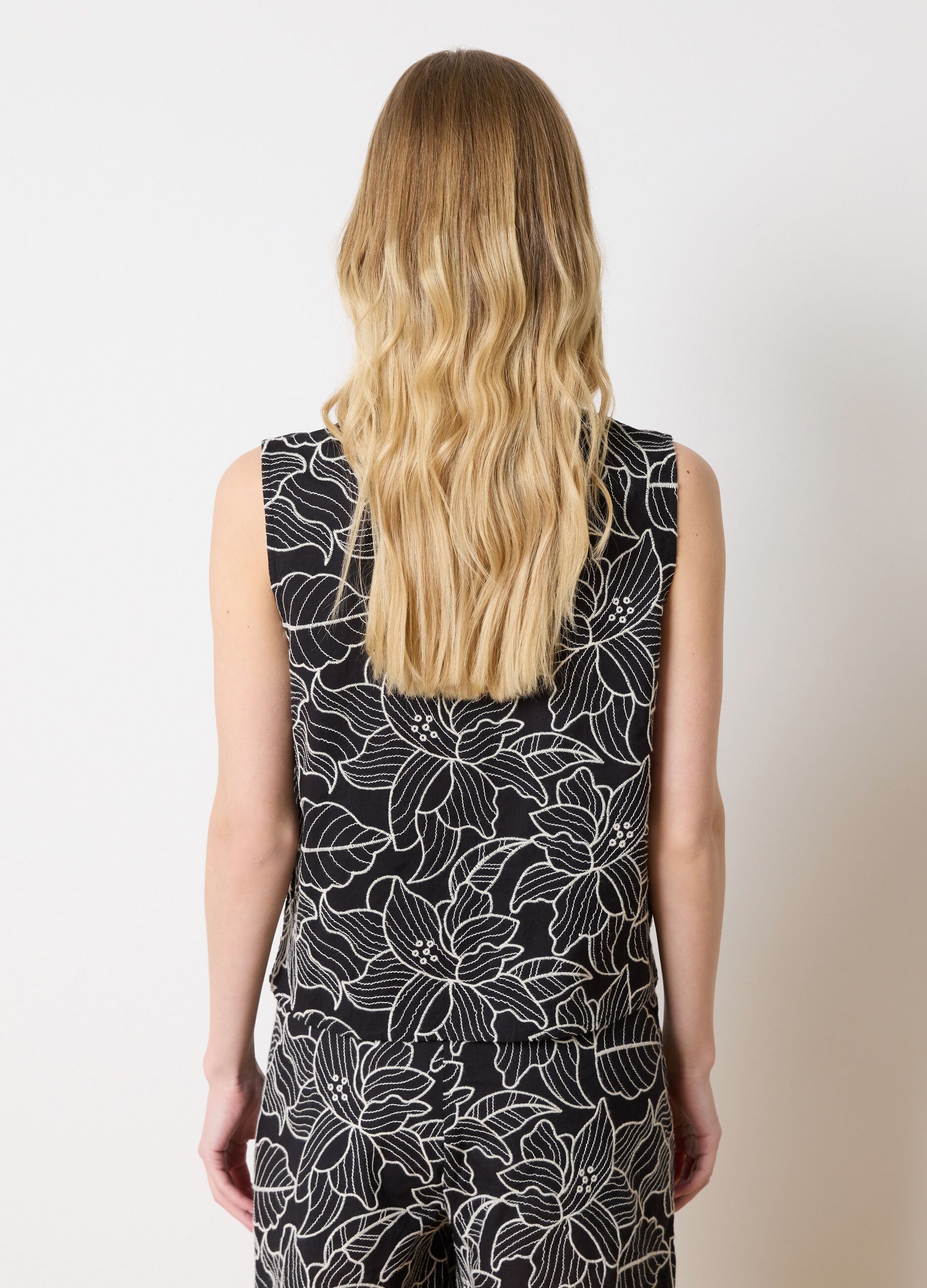 Sleeveless top with floral embroidery