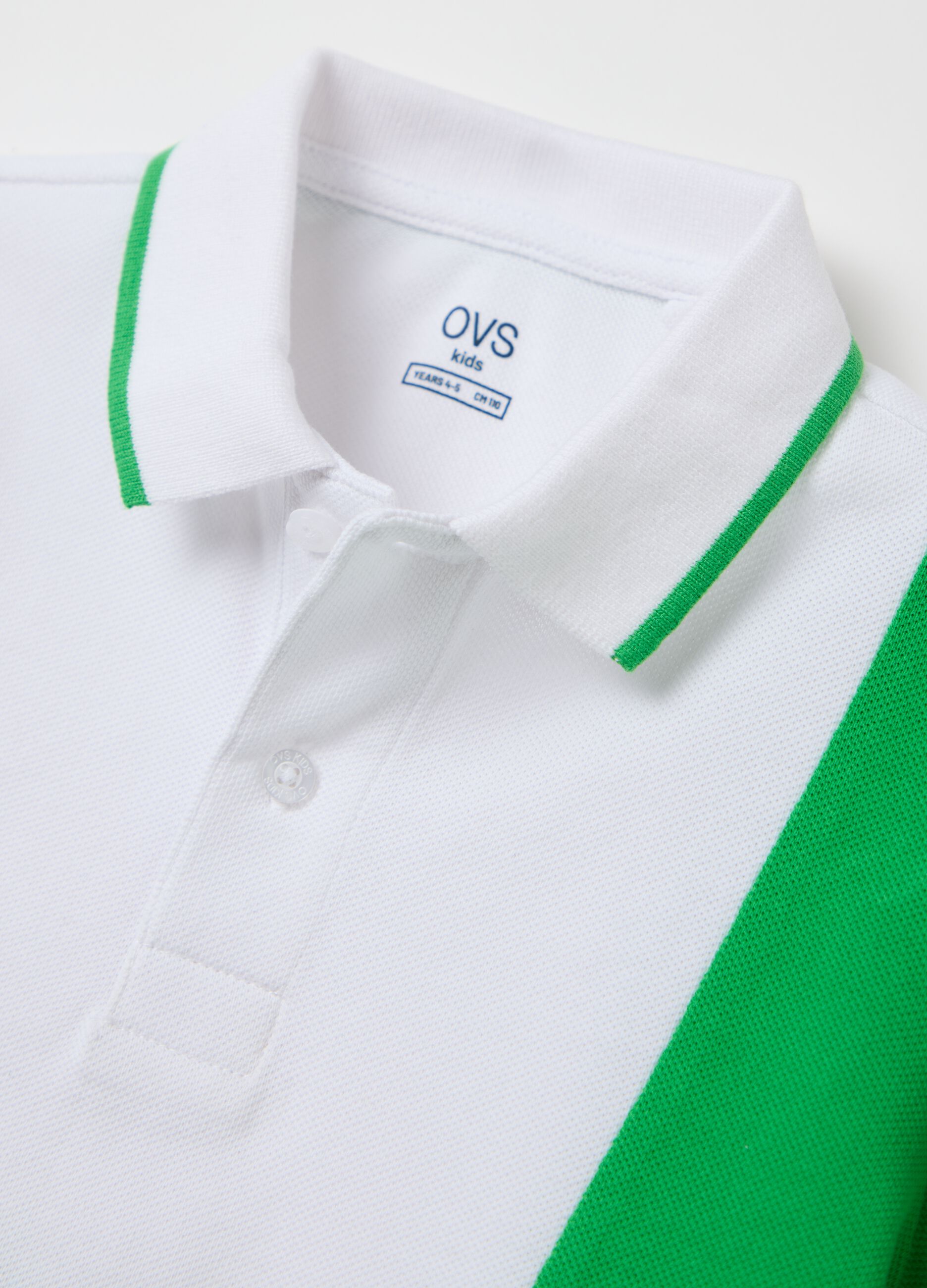 White piquet polo shirt with colourblock print