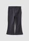 Black flared leggings in stretchy organic cotton blend with heart print for baby girl_1