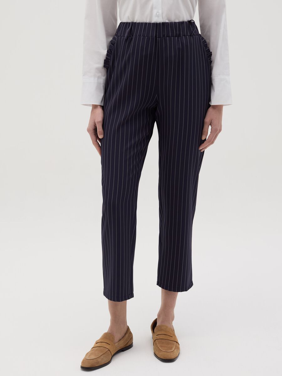 Cropped pinstriped trousers with frills_1