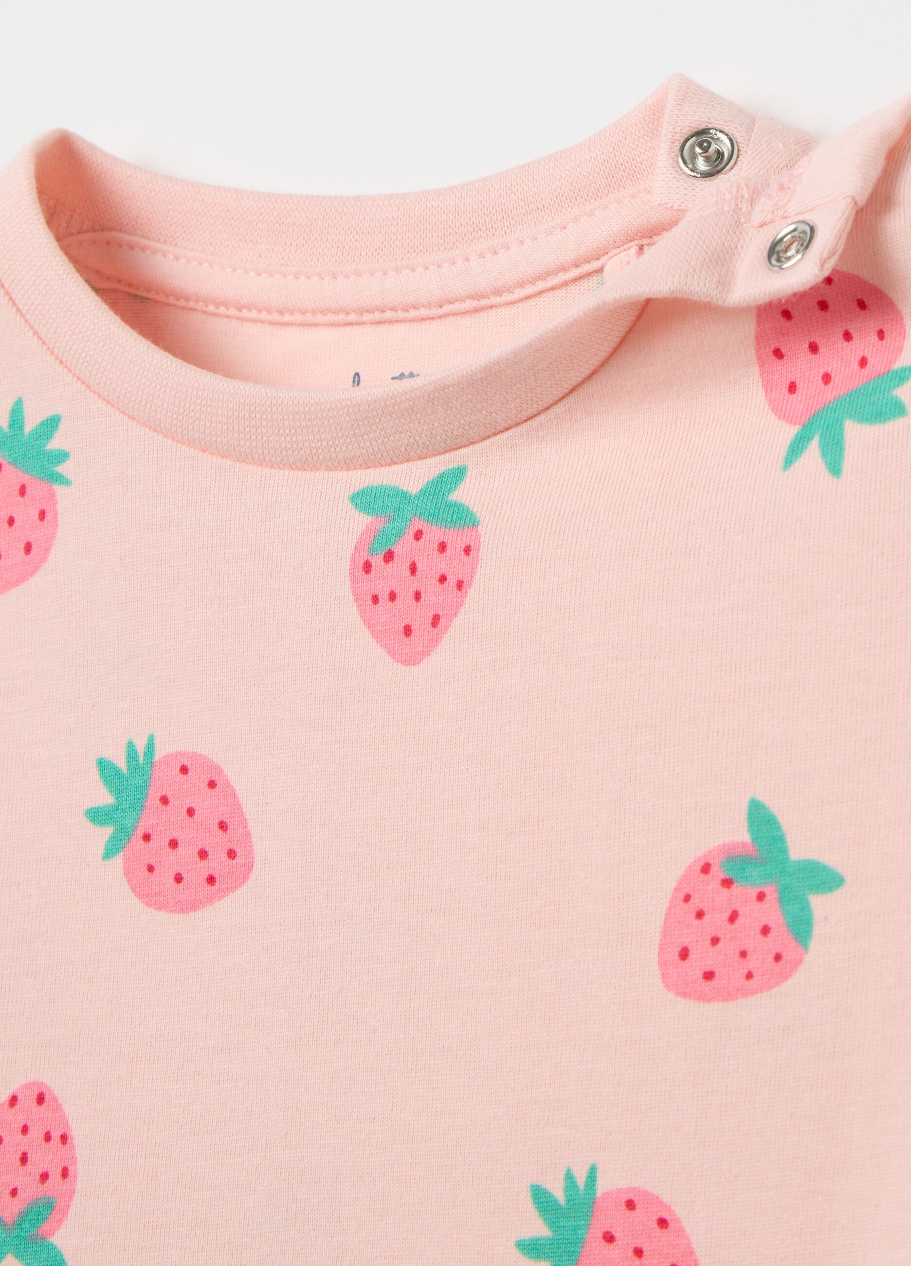 Pink organic cotton pyjamas with strawberries print