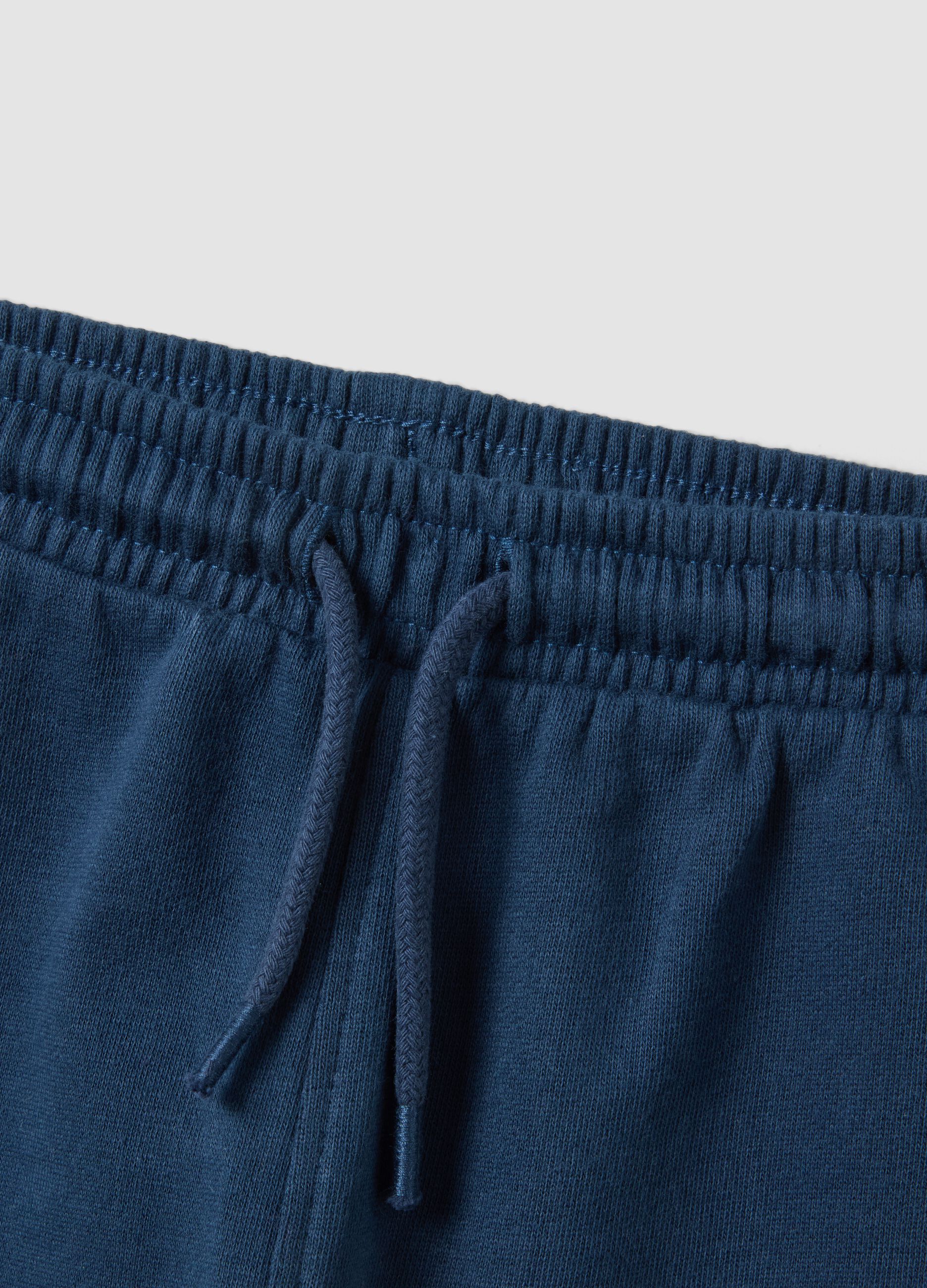 Blue organic cotton jogger trousers with drawstring for boys