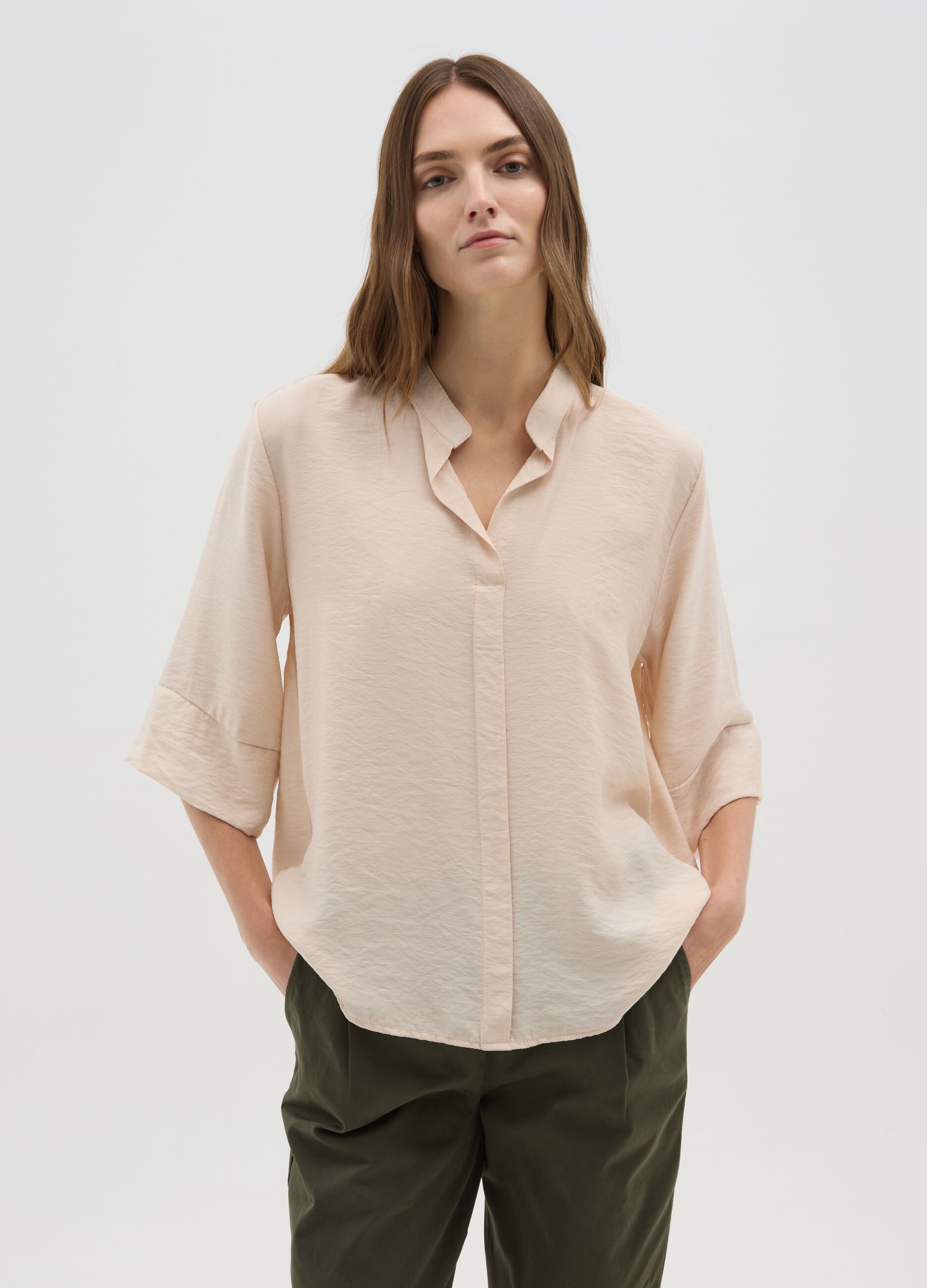 Beige blouse with V-neck and wide sleeves