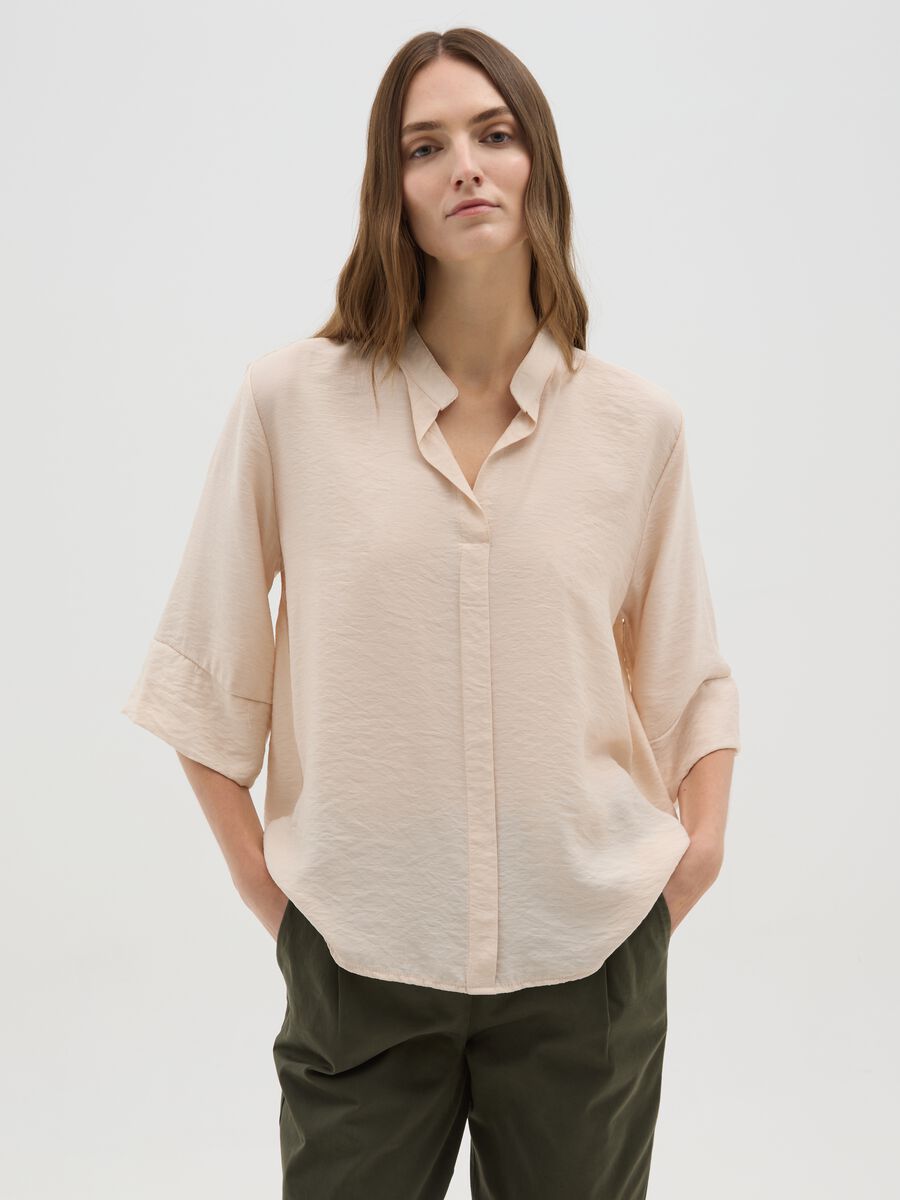 Beige blouse with V-neck and wide sleeves_0