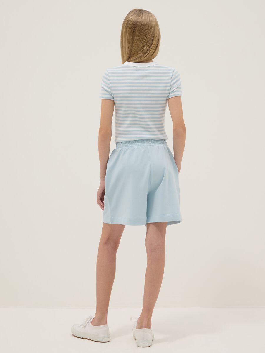 Shorts in puro cotone azzurri da ragazza oversize fit_1