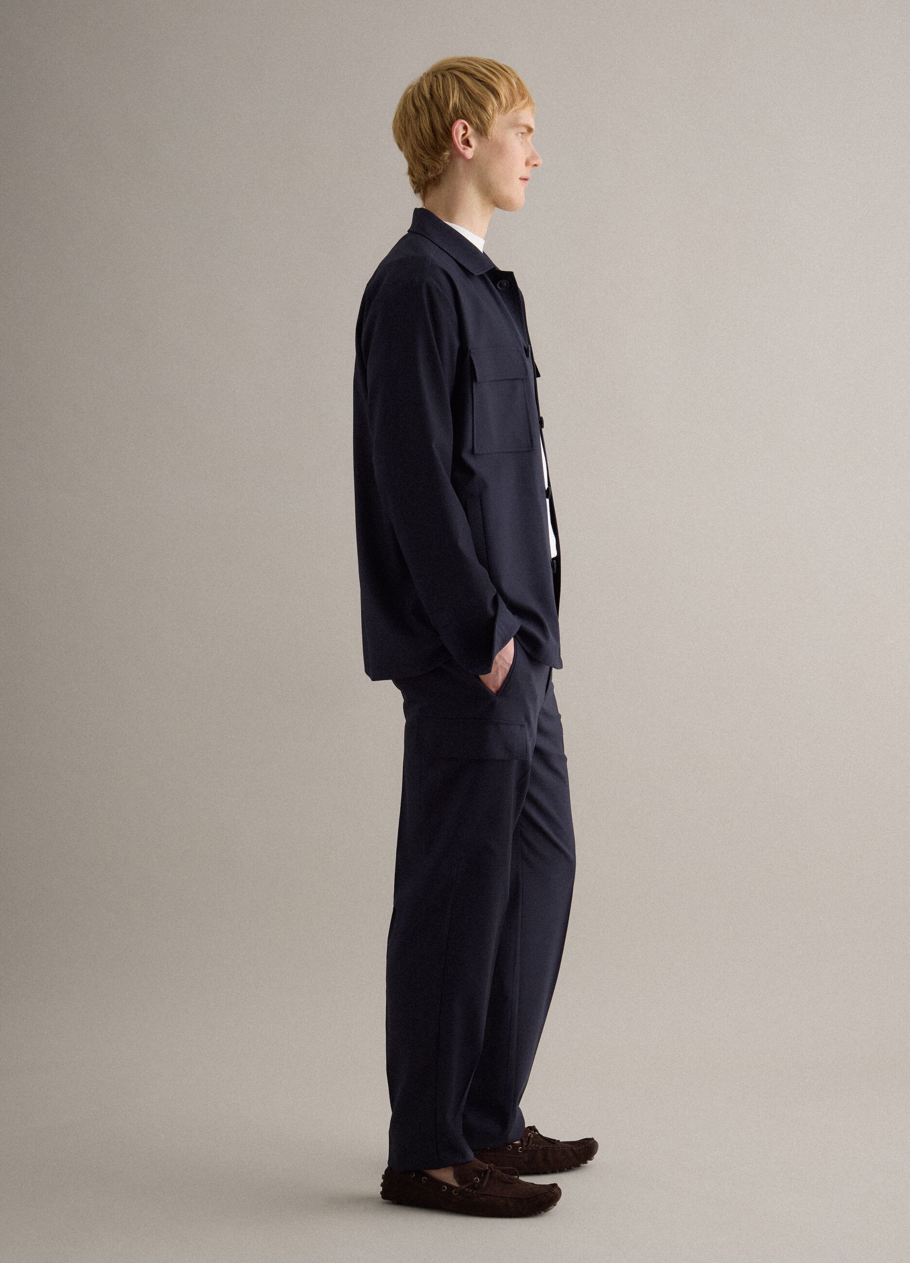 Light blue regular fit jacket with buttons and front pockets