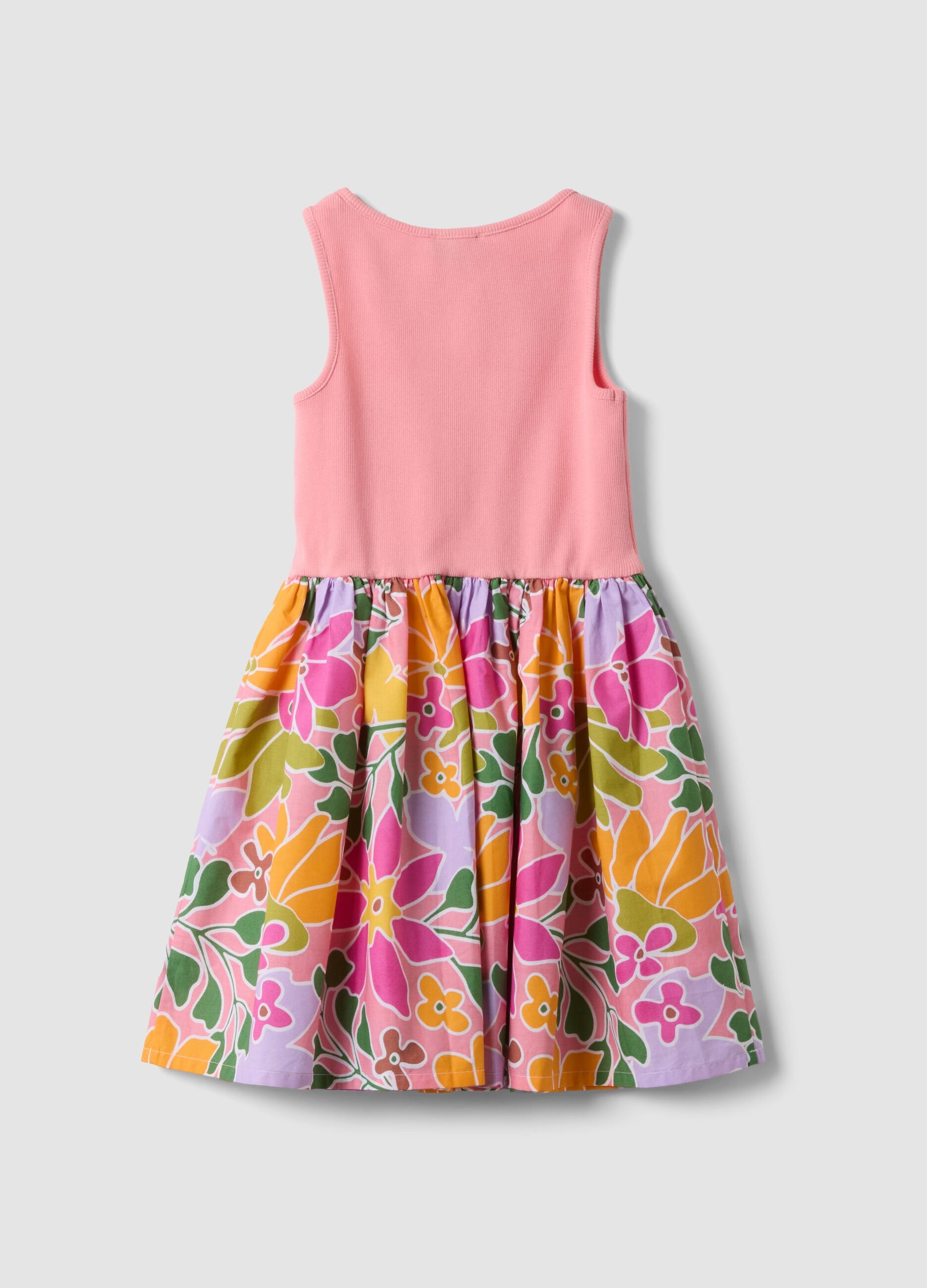Abito rosa in cotone elasticizzato con gonna fantasia floreale per bambina