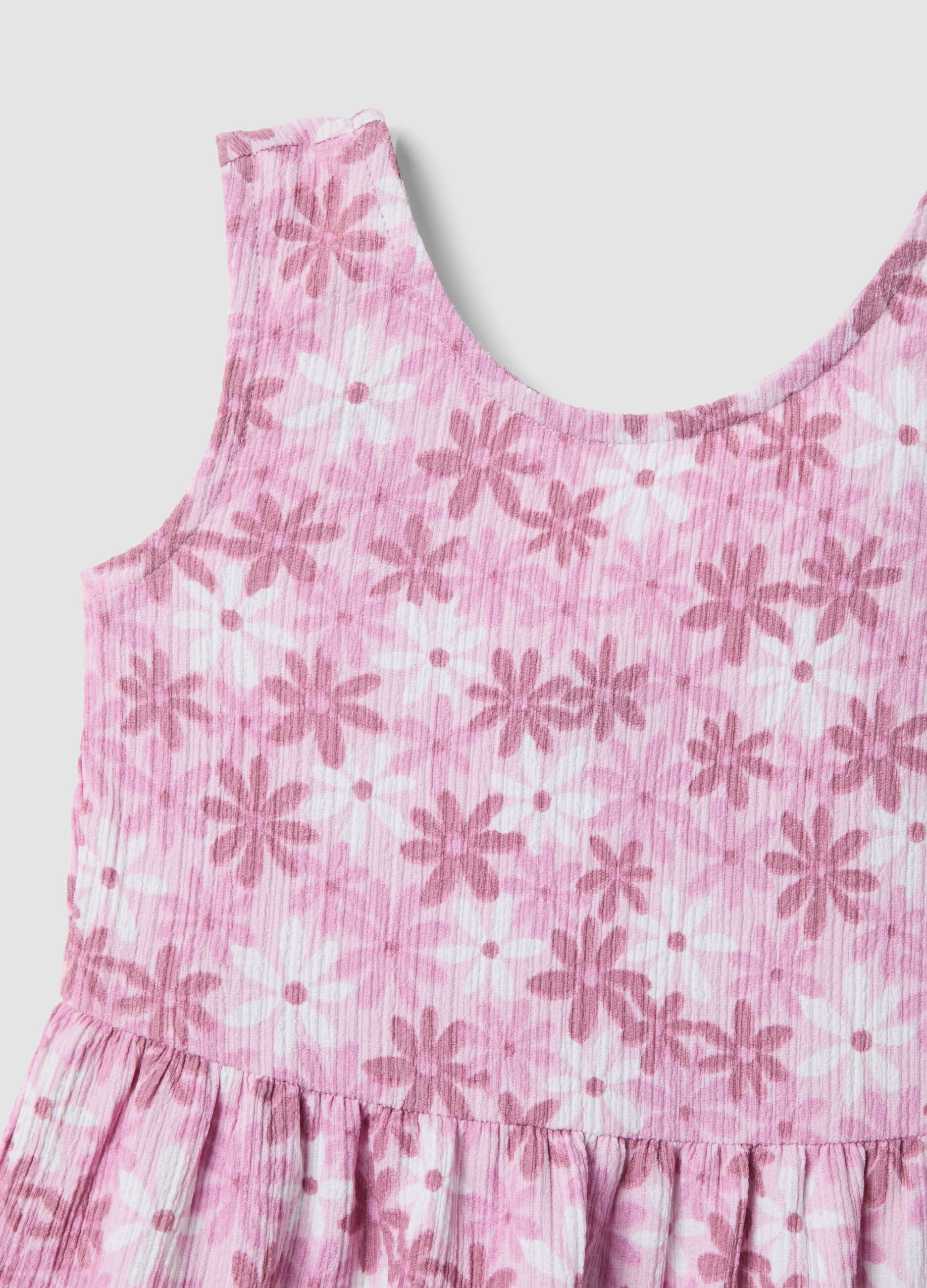 Pink sleeveless stretch dress with floral print