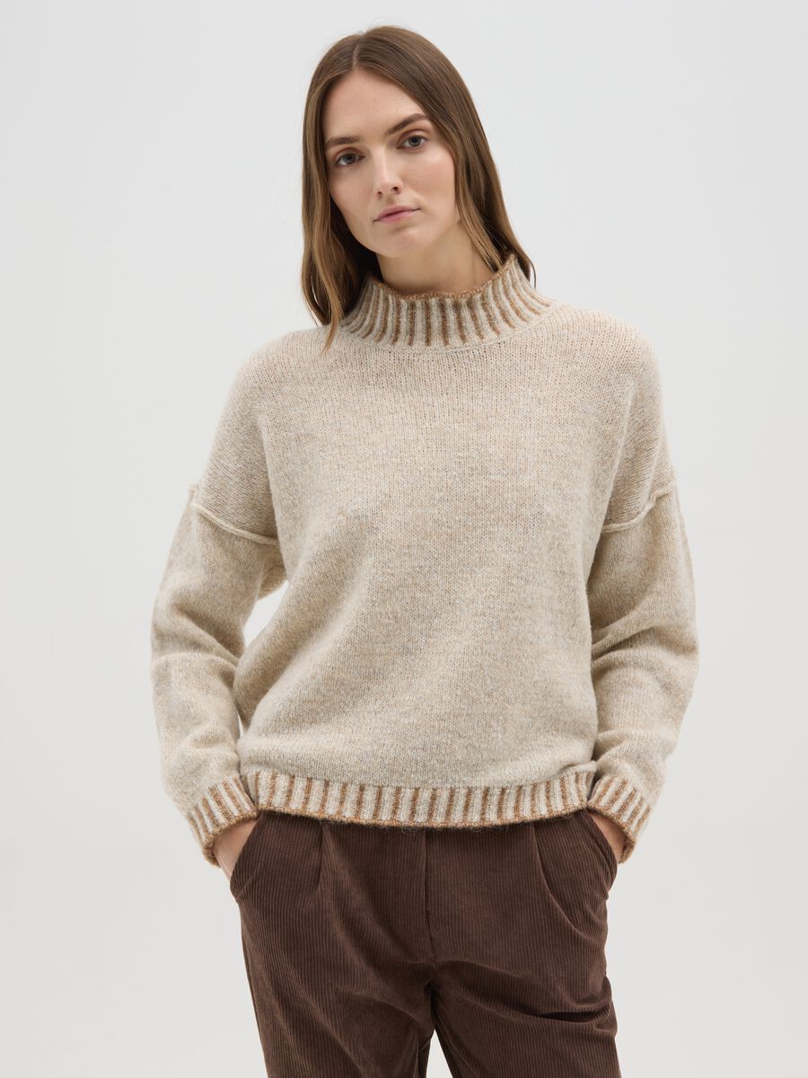 Beige sweater with high neck and contrasting edges_0