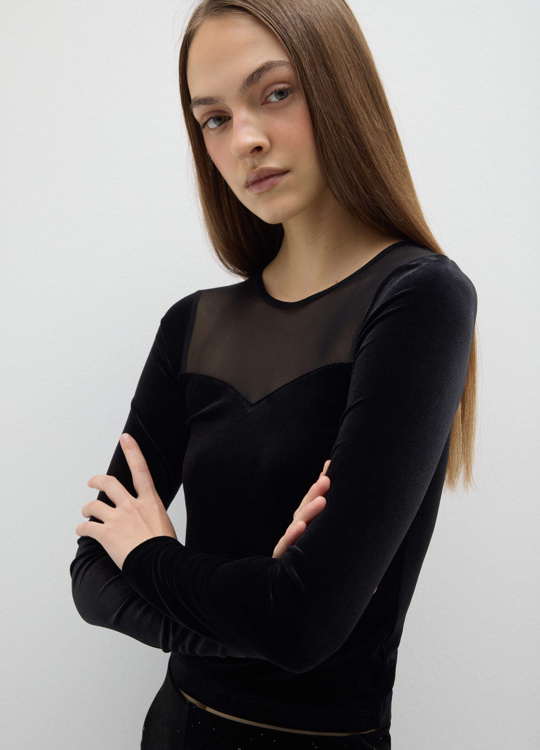 Black long-sleeve regular fit top with sheer details
