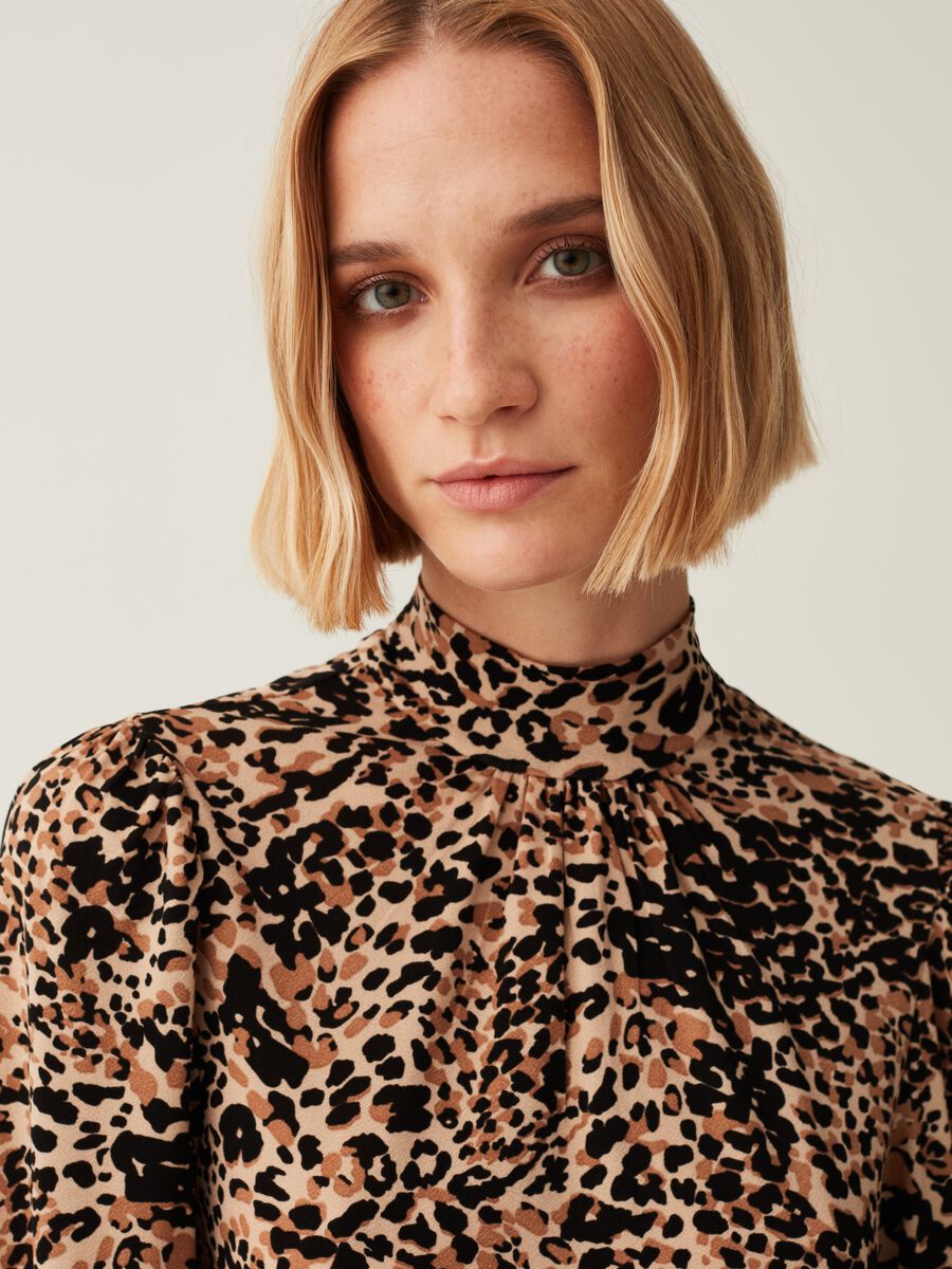 Abito corto mock neck fantasia_1