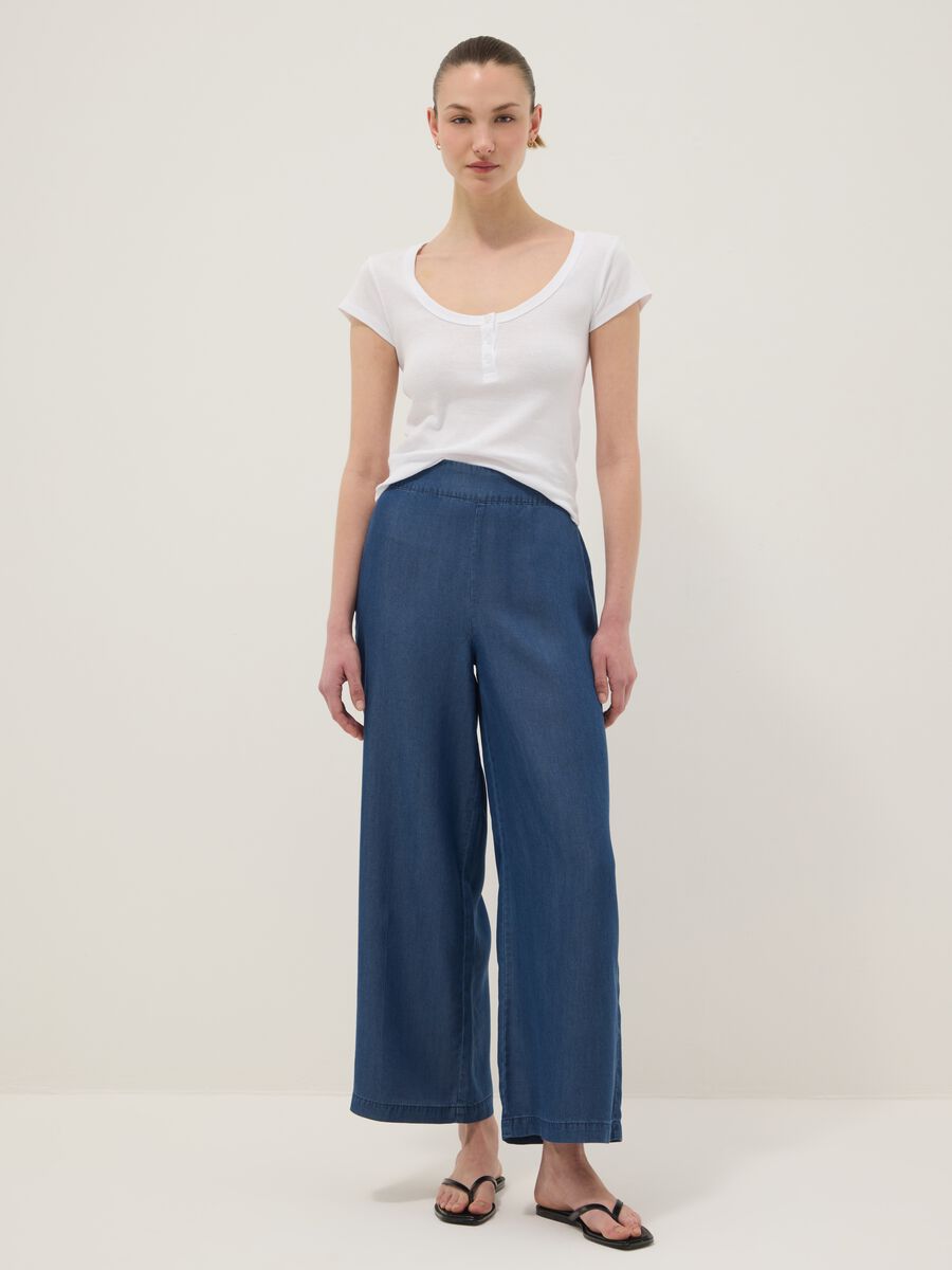 Dark blue pure lyocell palazzo trousers with elasticated waist and wide leg_0