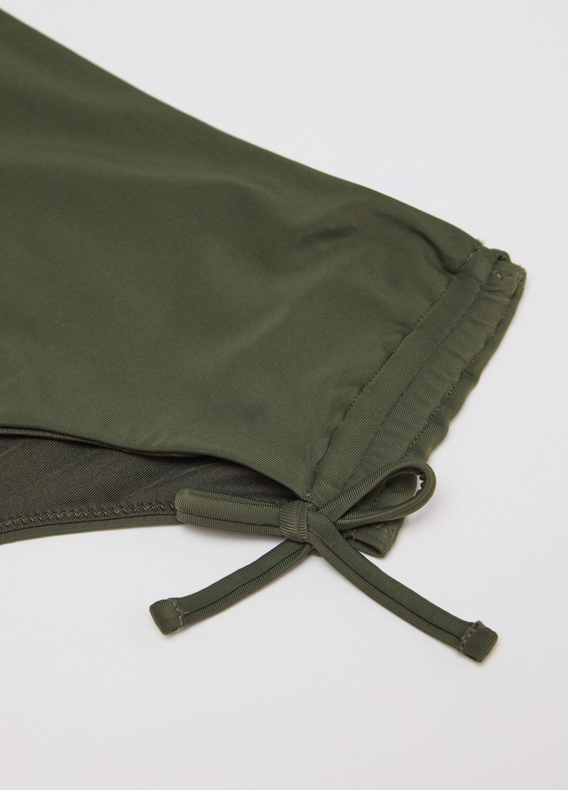 Women’s high-rise green bikini briefs in stretch microfibre