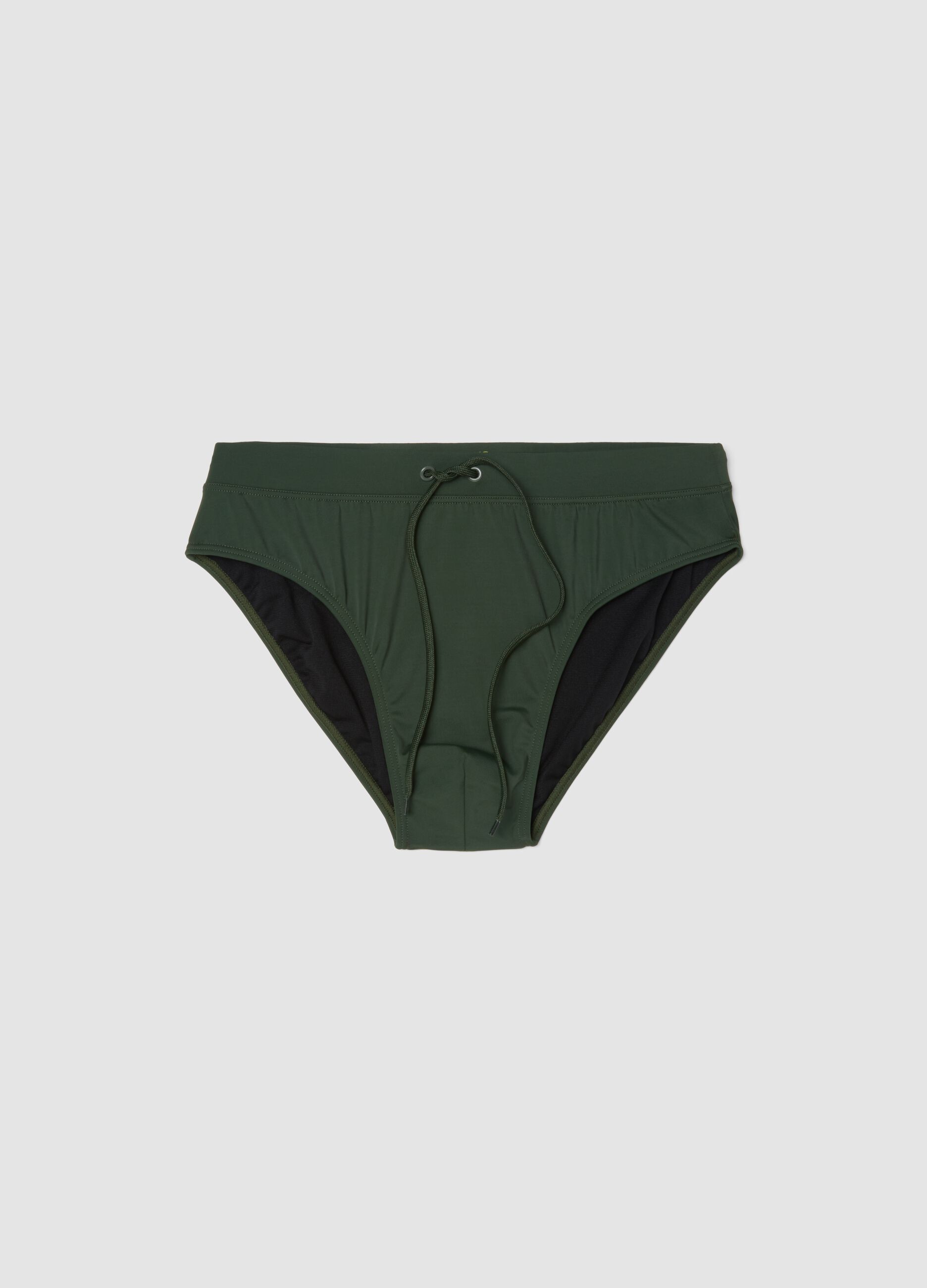 Green stretch fabric swim briefs