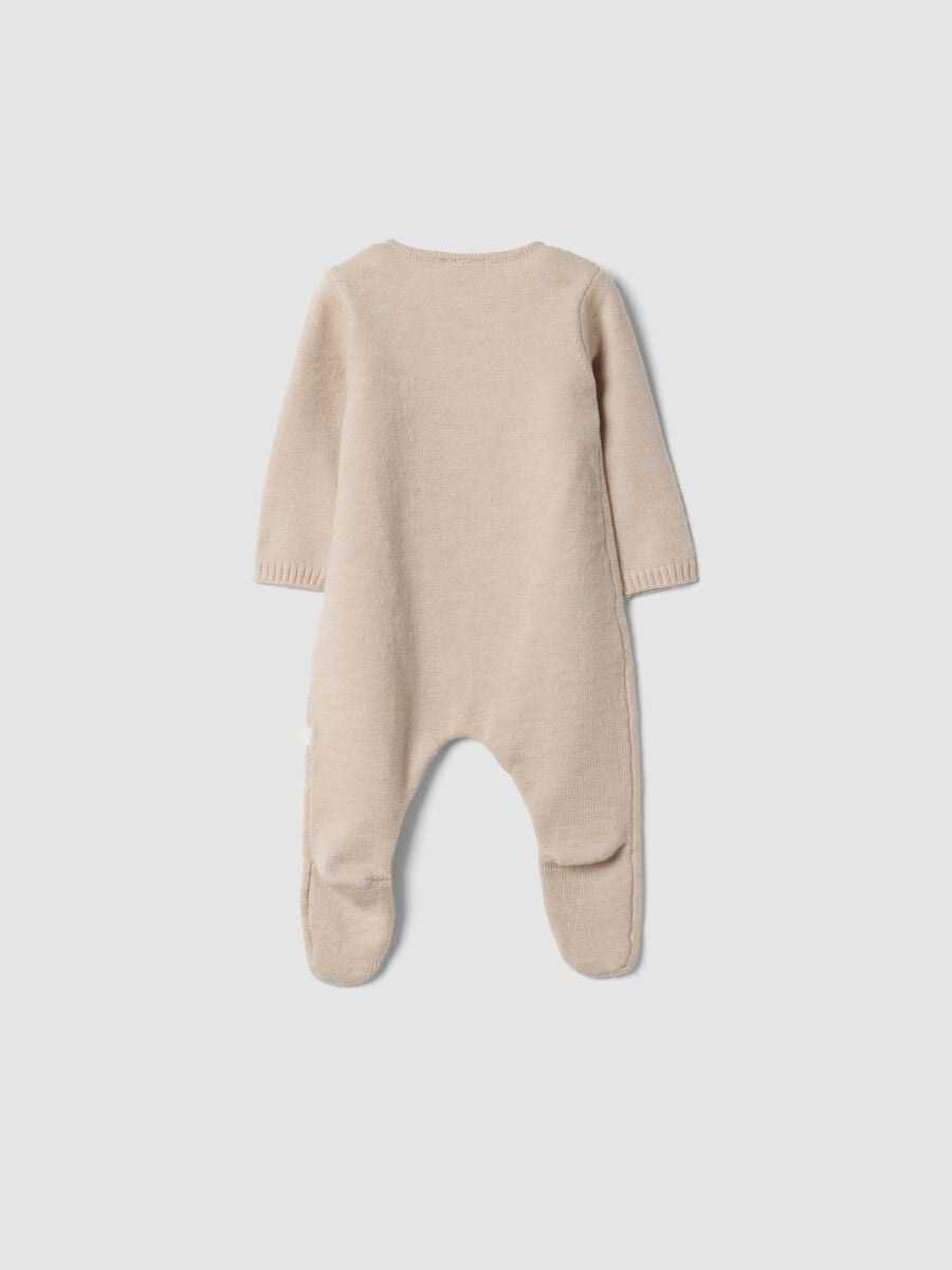 Tutina beige con piedini e chiusura incrociata_1