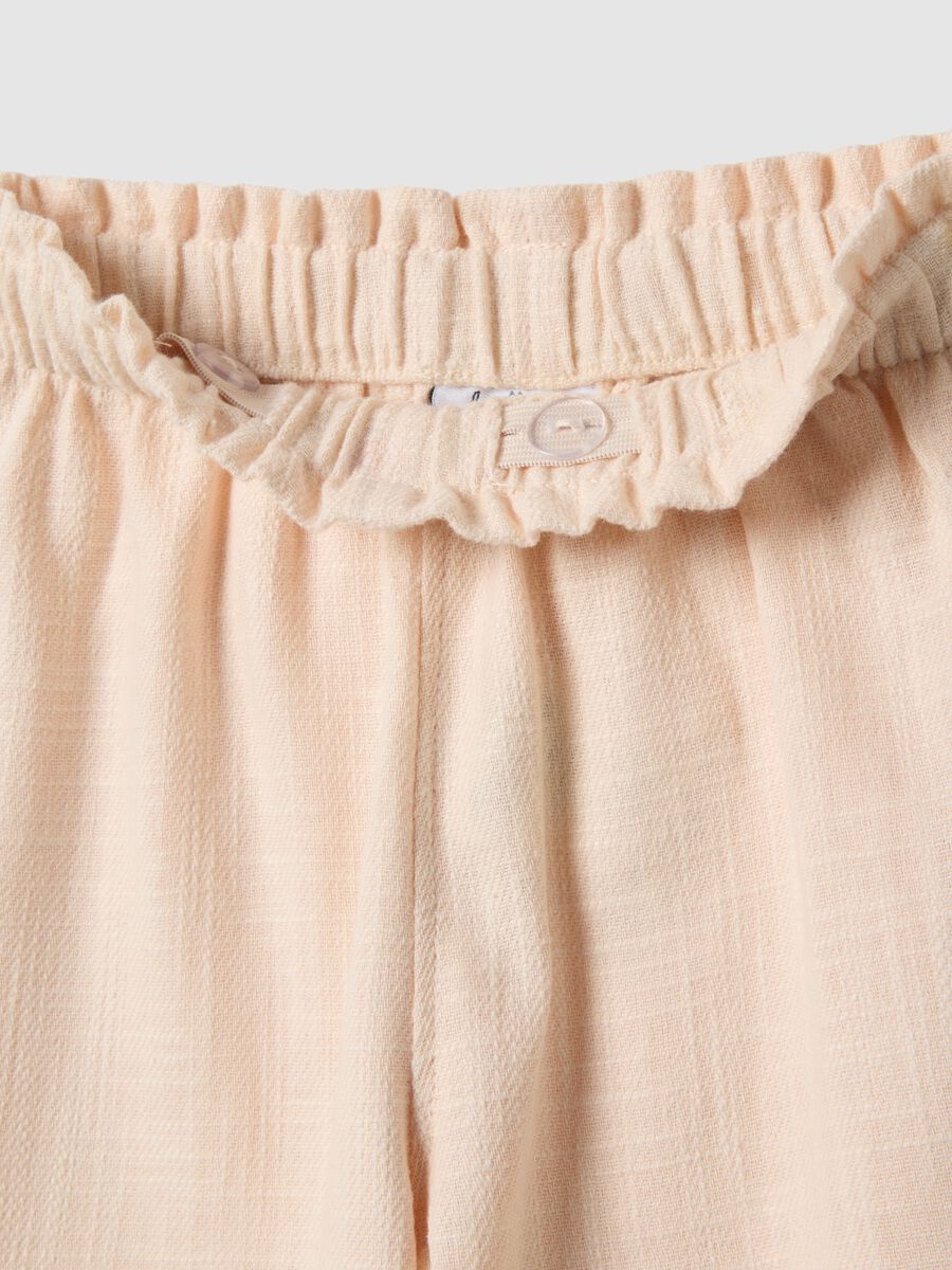 Beige culotte trousers in cotton and linen for girls with floral embroidery_2