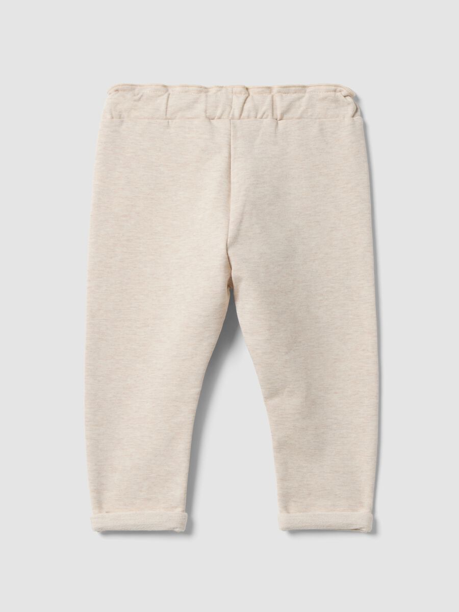 Jogger beige in cotone elasticizzato con risvolto per bimba_1