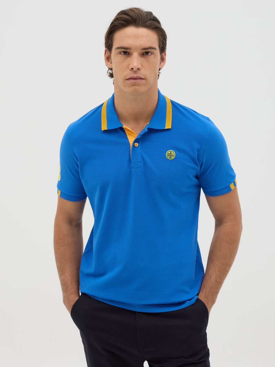 Light blue polo shirt in cotton with Navy Sport patch_0