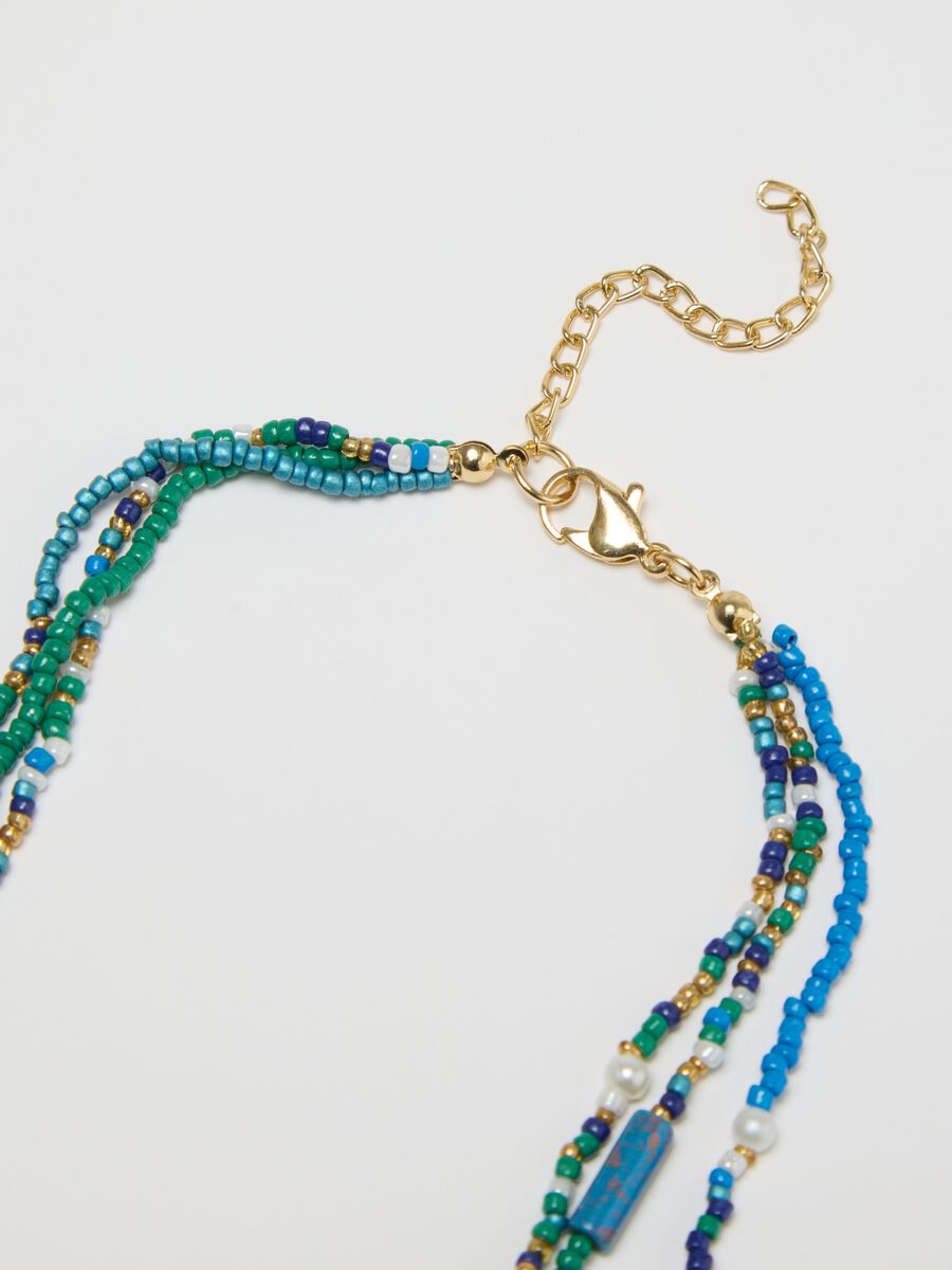 Multi-strand necklace with beads and shell_2