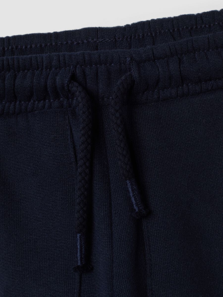 Pantaloni jogger blu in puro cotone con motivo animalier_2
